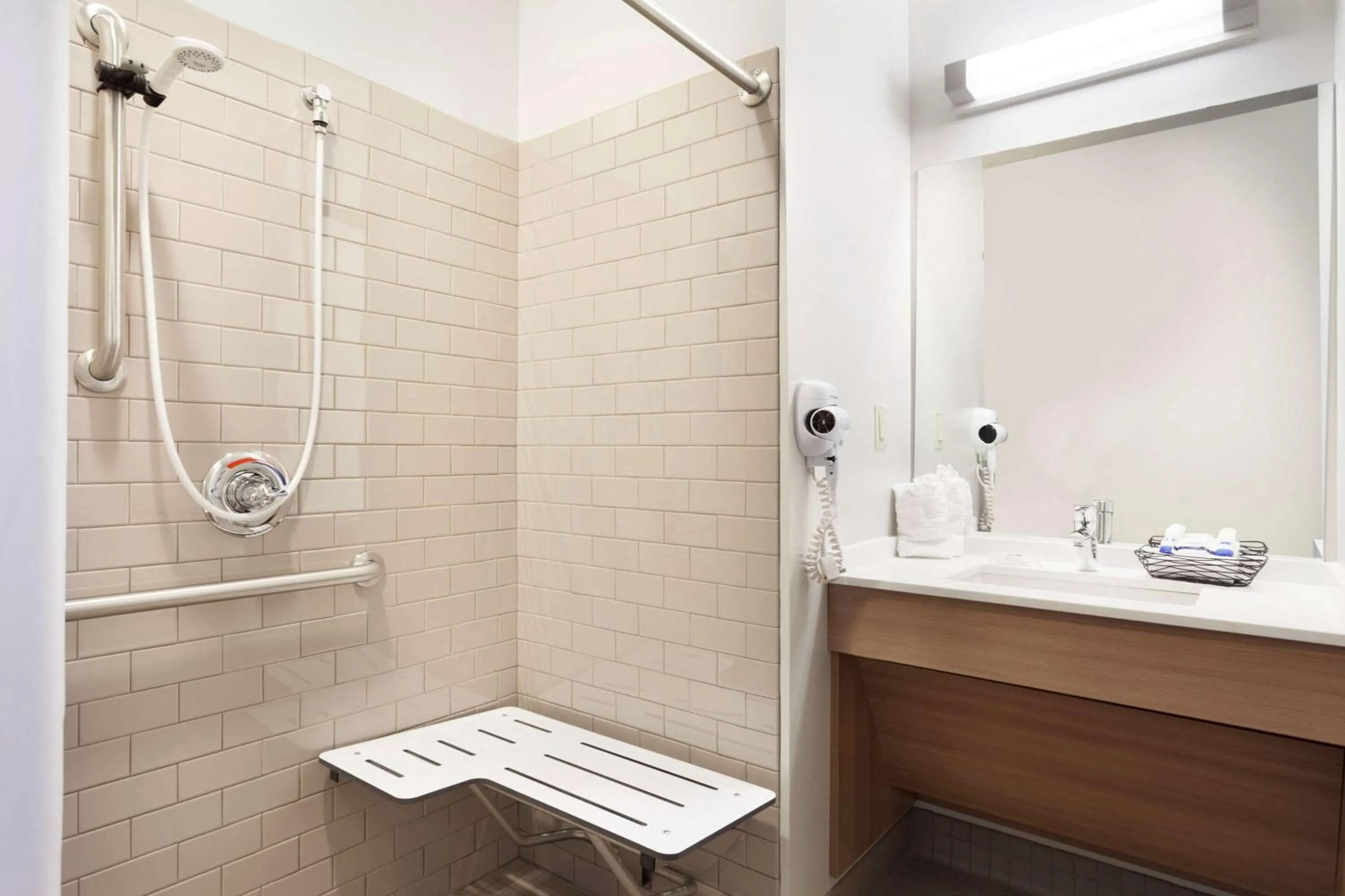 Bathroom in Microtel Inn & Suites by Wyndham Georgetown Delaware Beaches