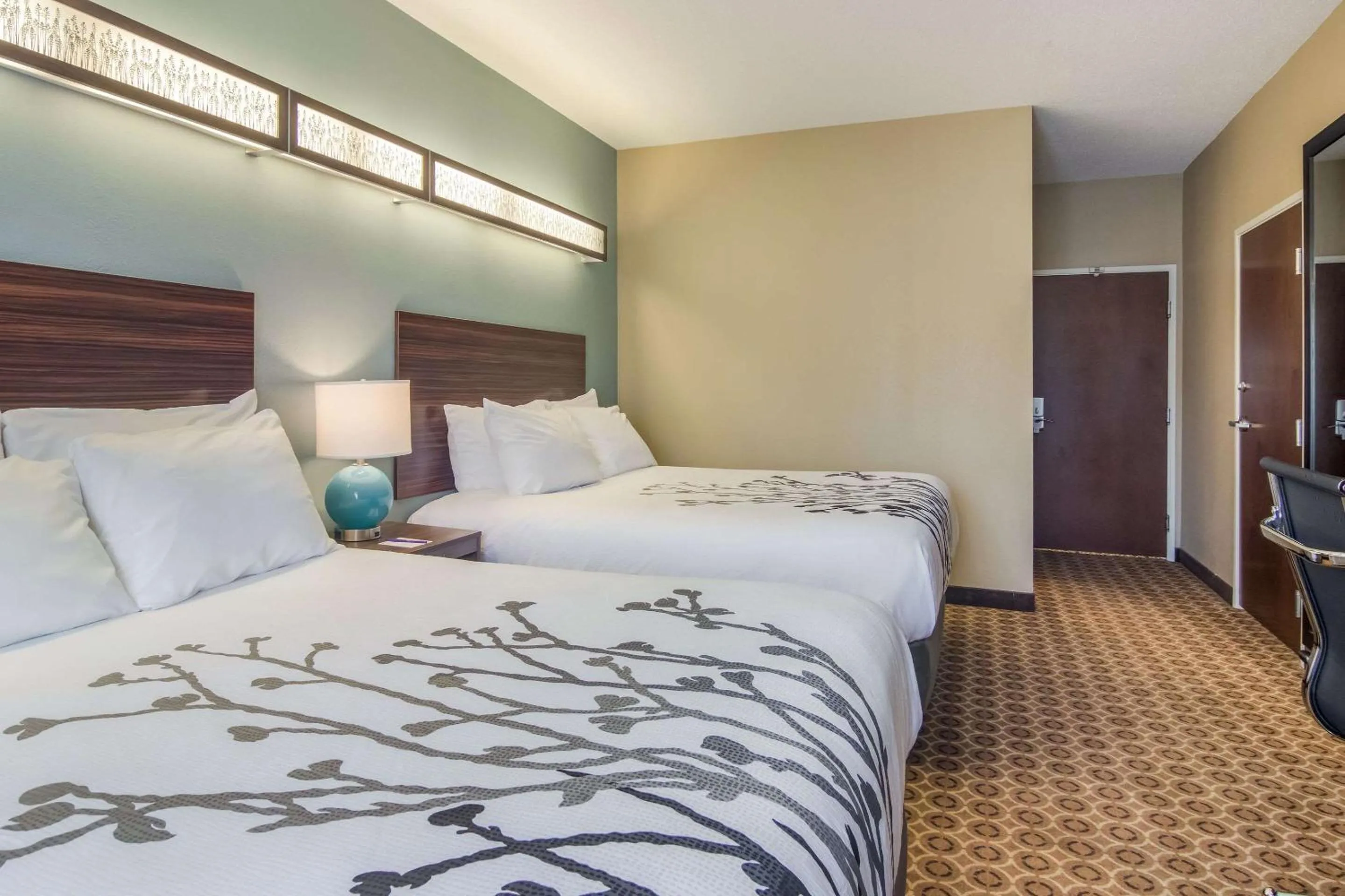 Bedroom in Sleep Inn & Suites Steubenville at the University