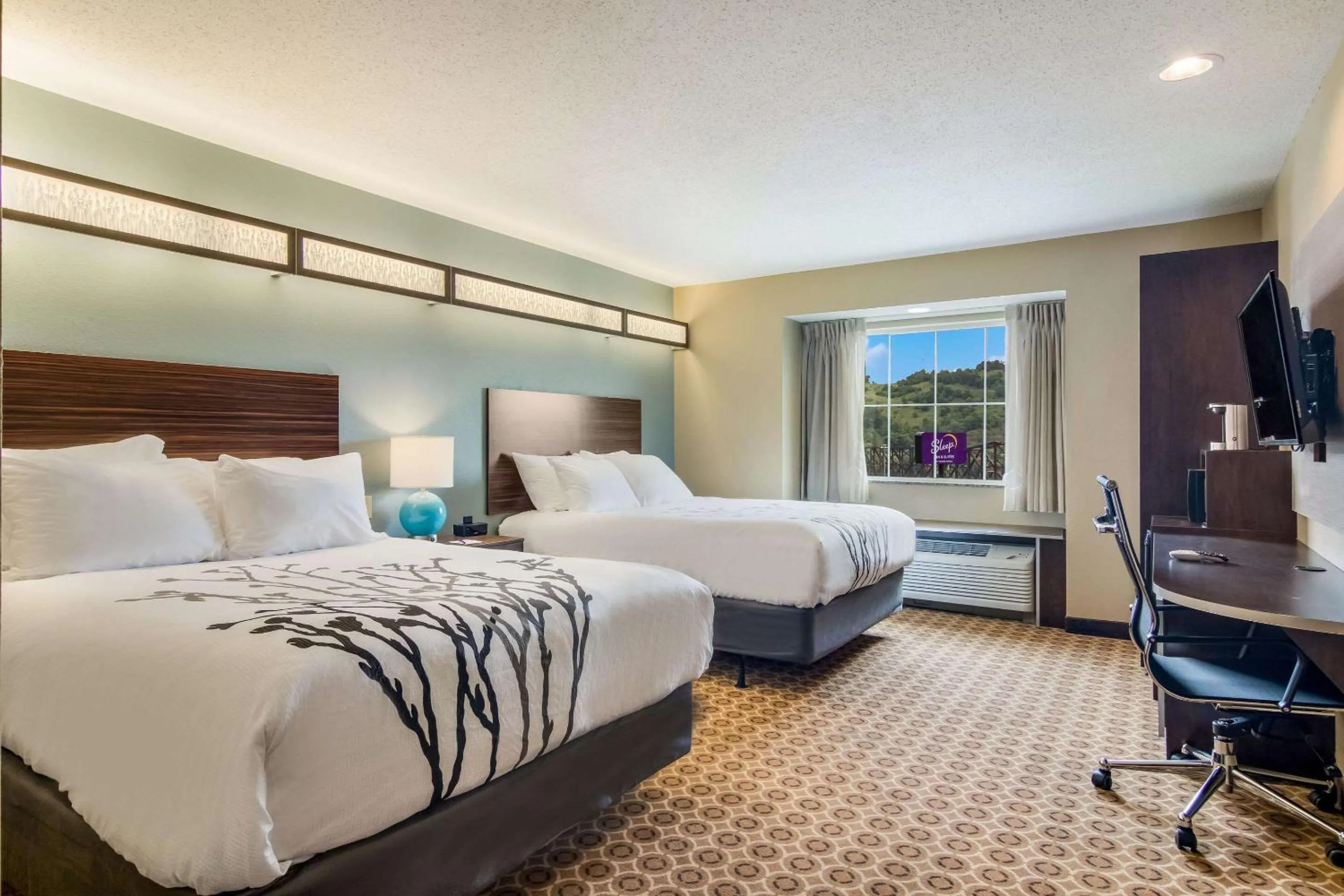 Bedroom in Sleep Inn & Suites Steubenville at the University