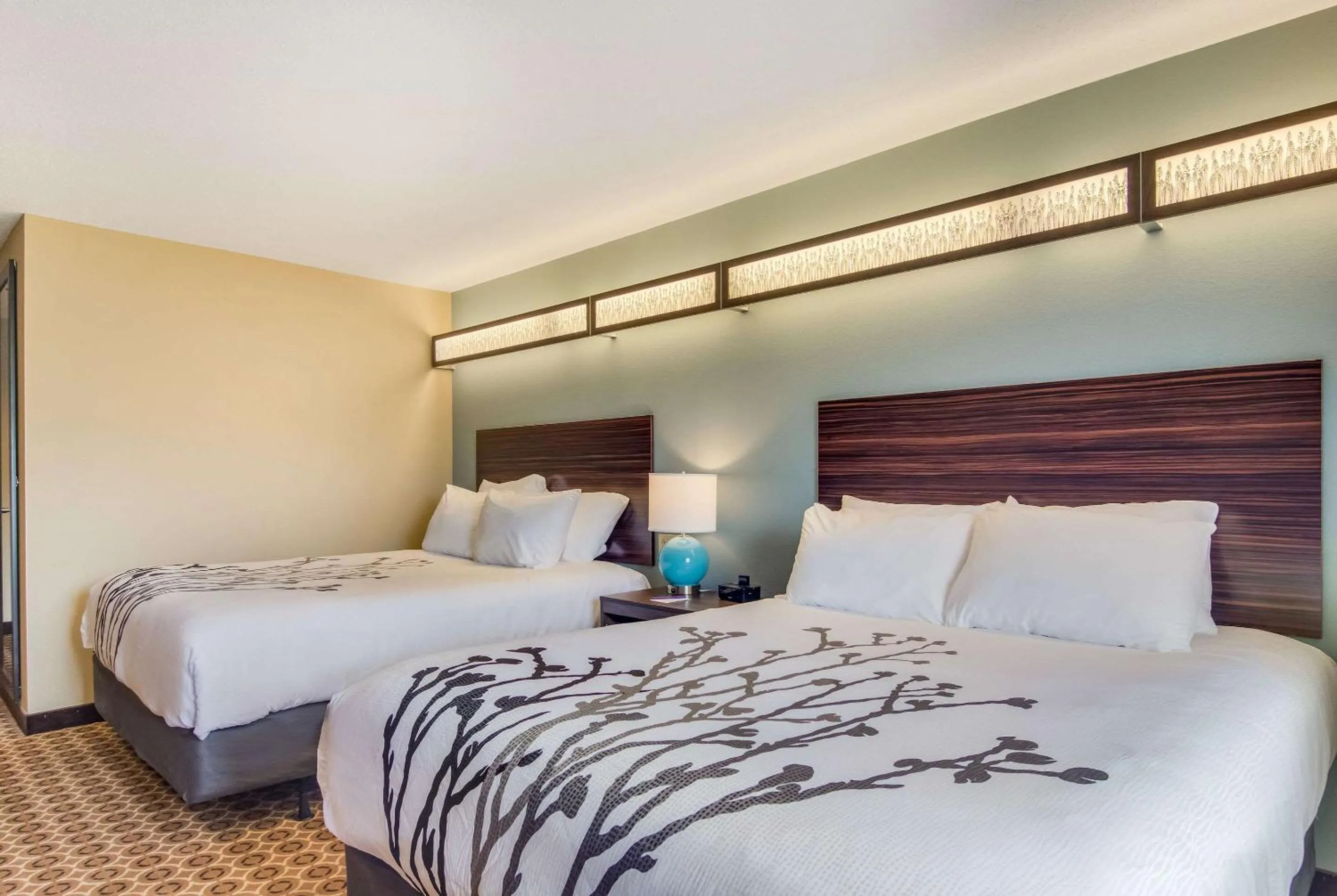 Bedroom in Sleep Inn & Suites Steubenville at the University