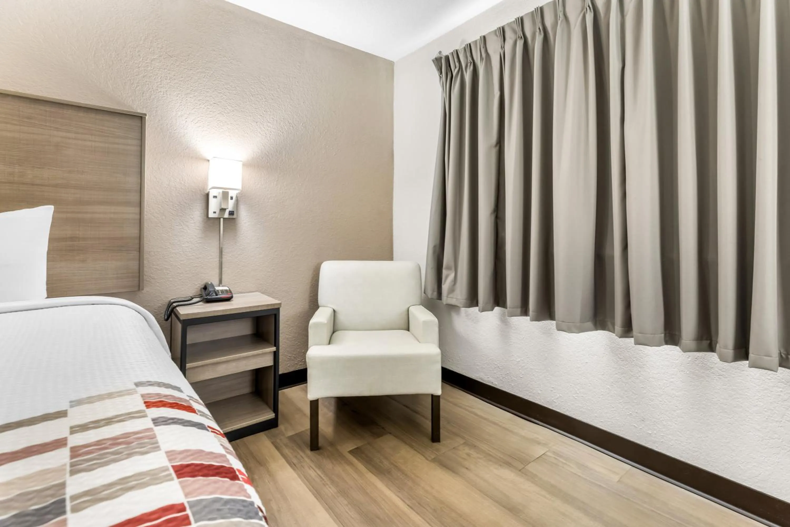 Photo of the whole room, Bed in Red Roof Inn Huntsville, AL