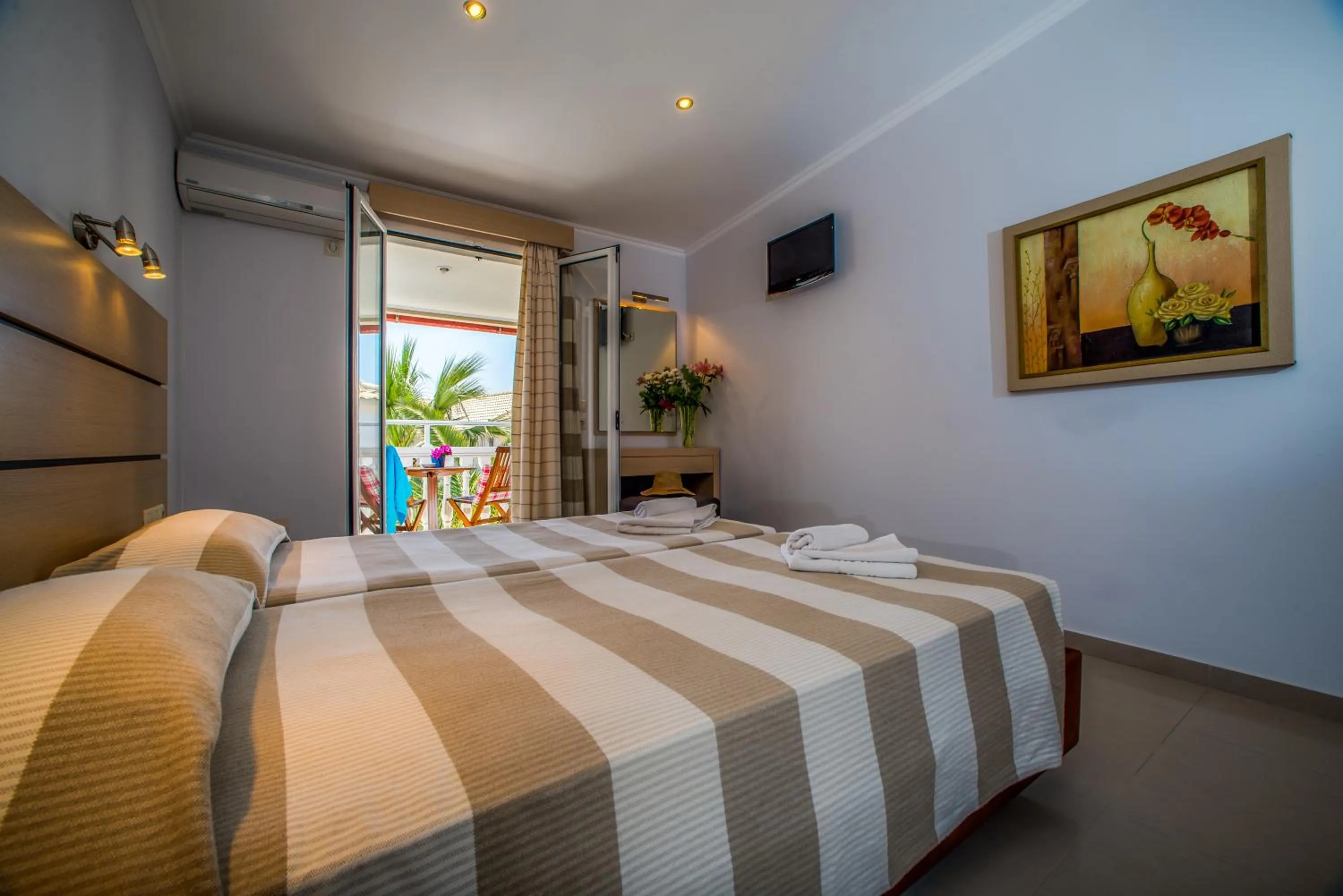 Bed in Natalie Hotel