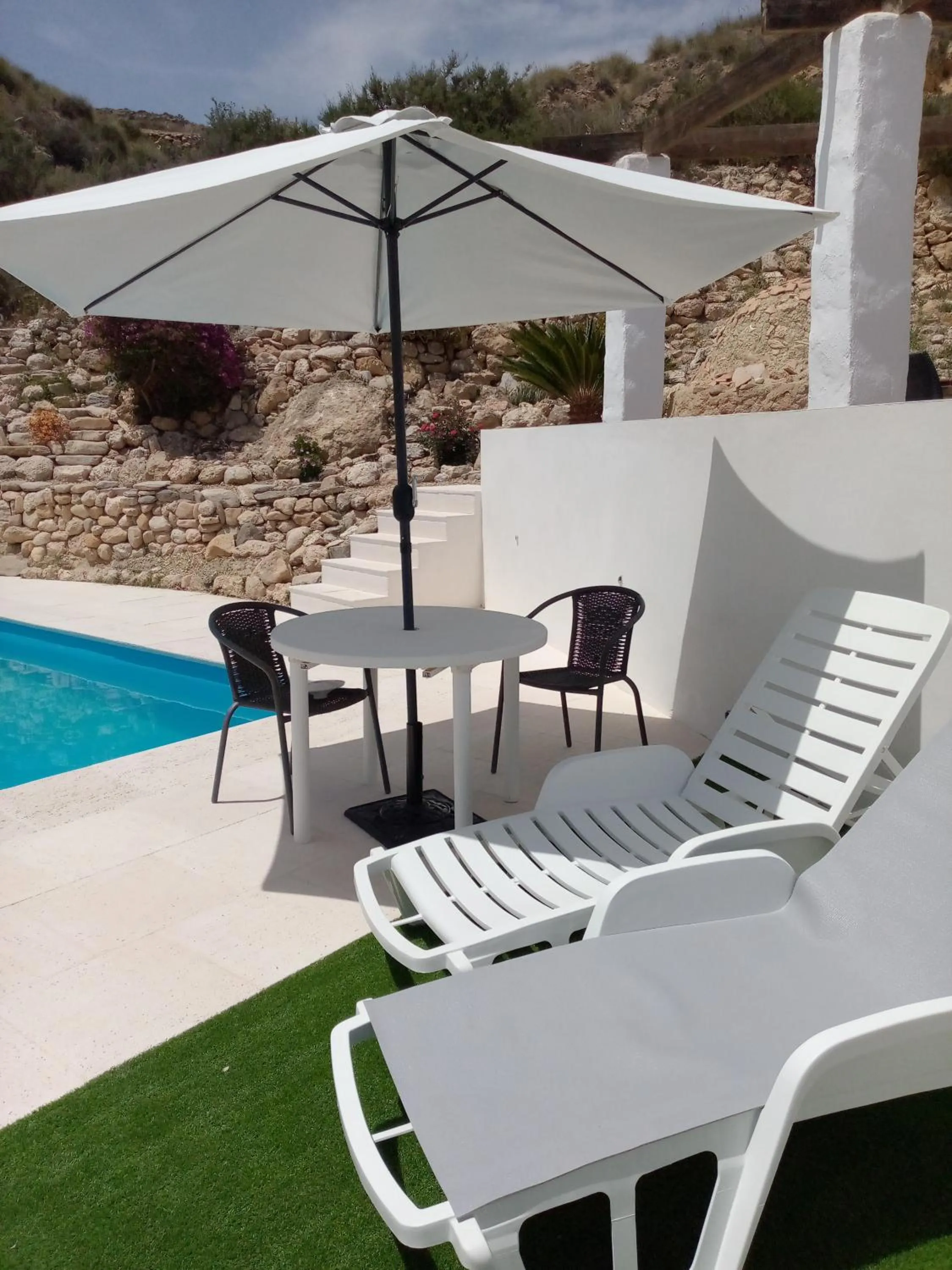 Swimming pool in Almond Reef Casa Rural