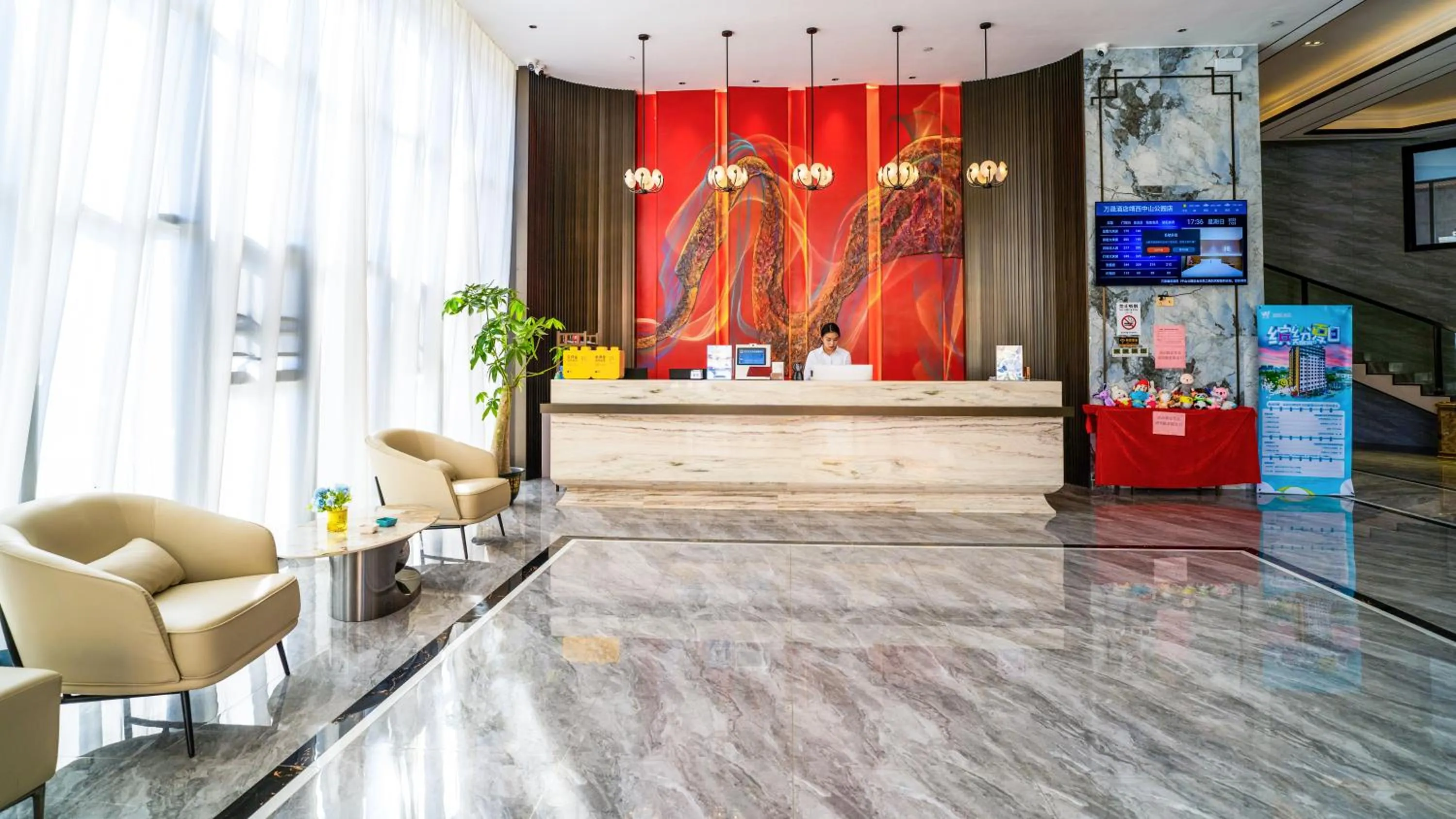 Lobby or reception in Wansheng Hotel