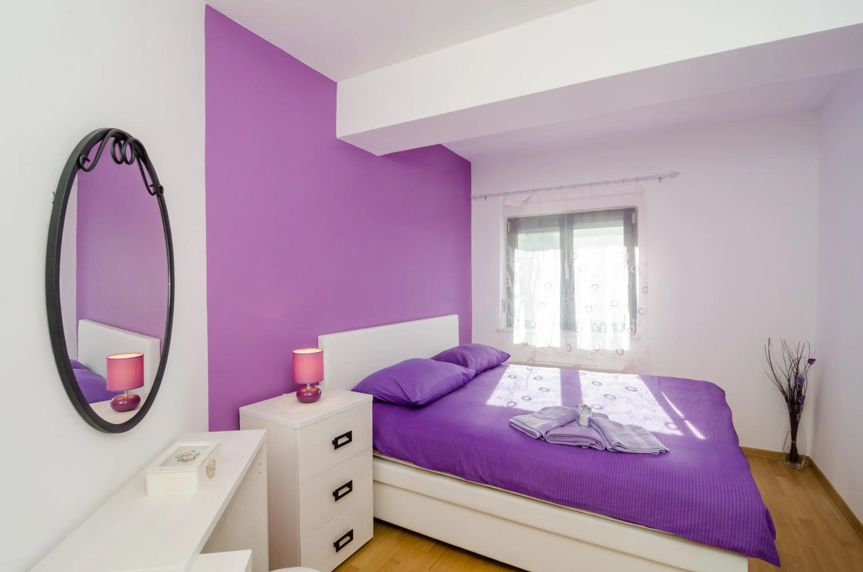 Bed in Apartment Atlant