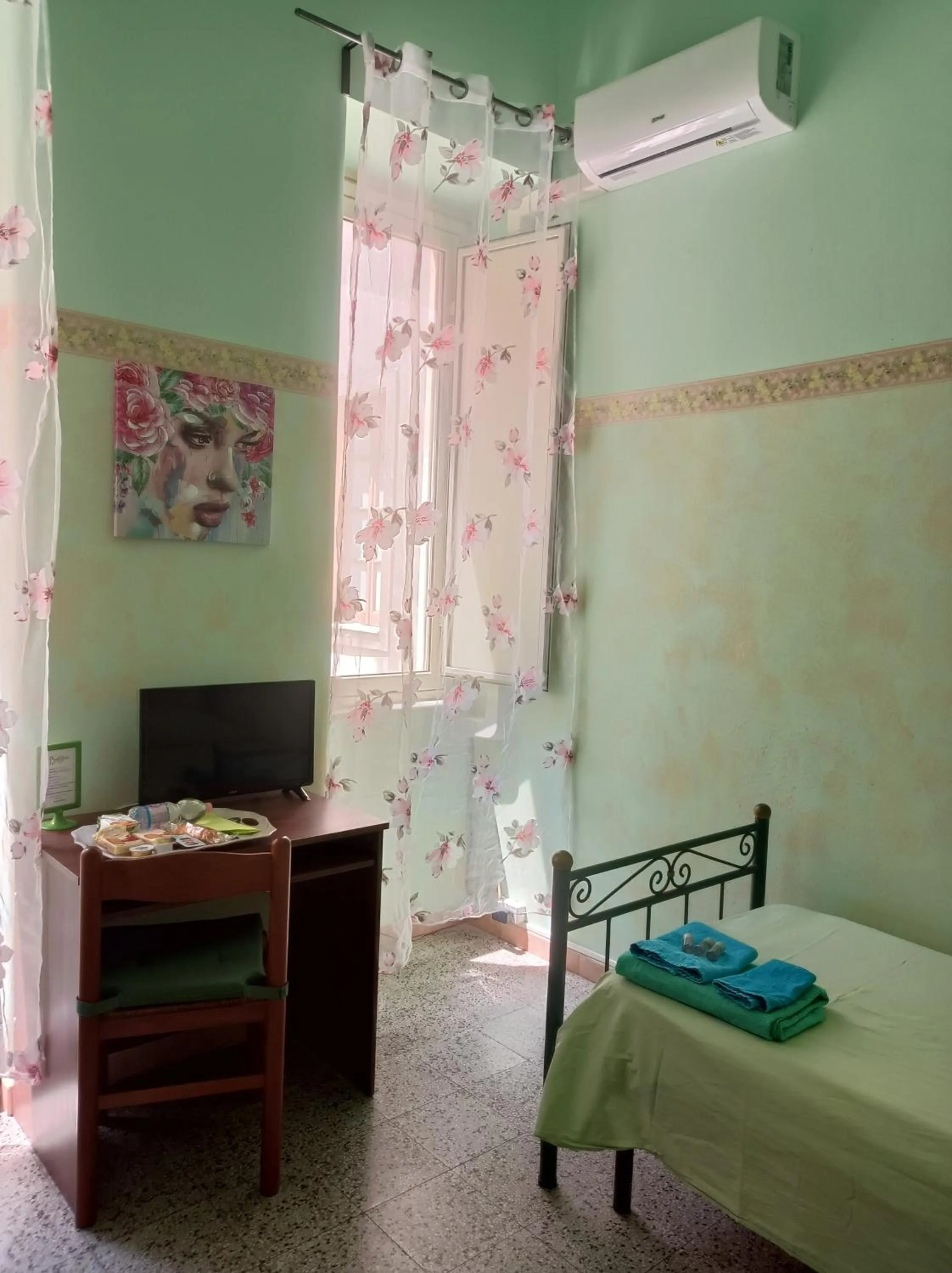 Bed in B&B Bella Stella