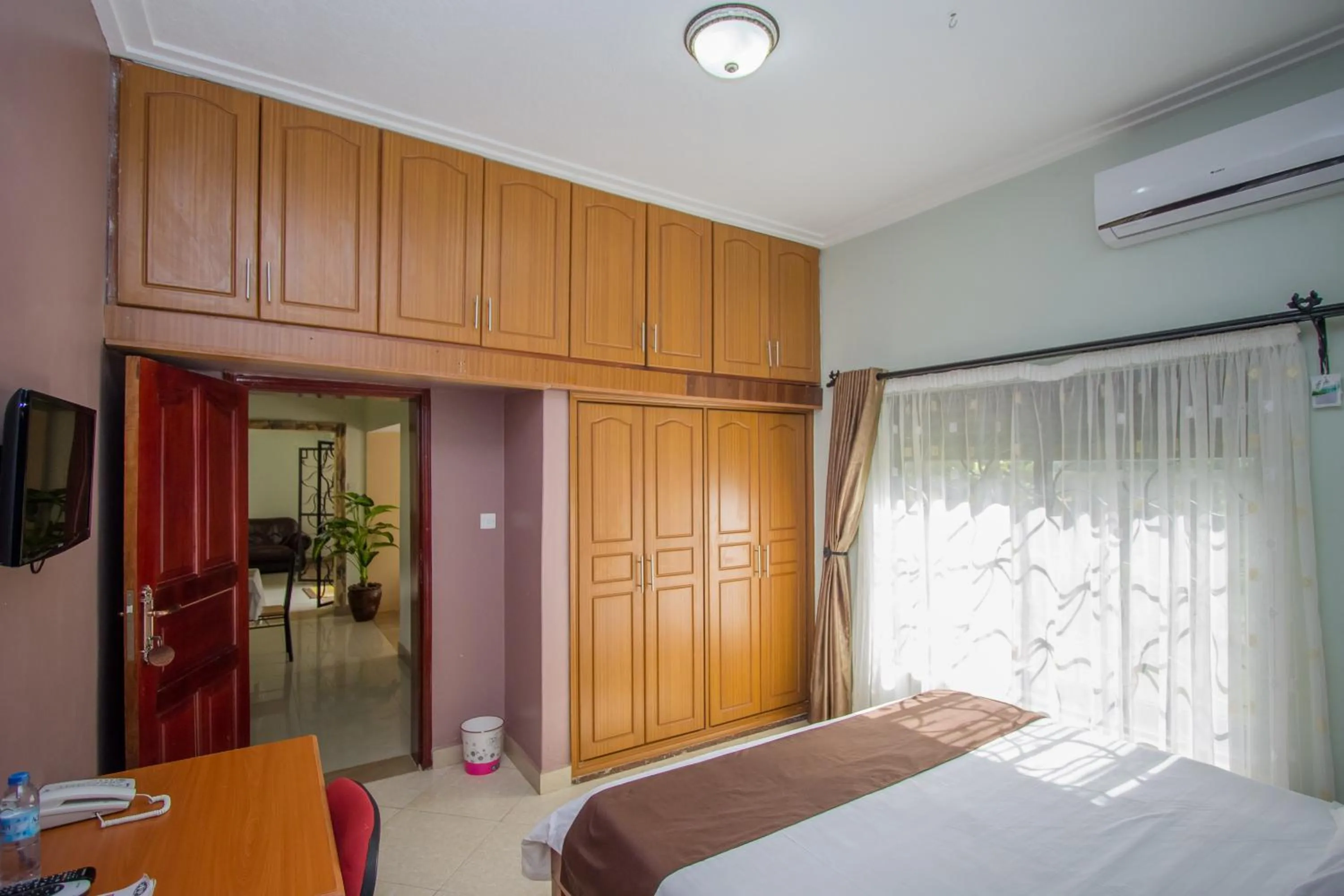 Living room, Bed in Askay Hotel Suites