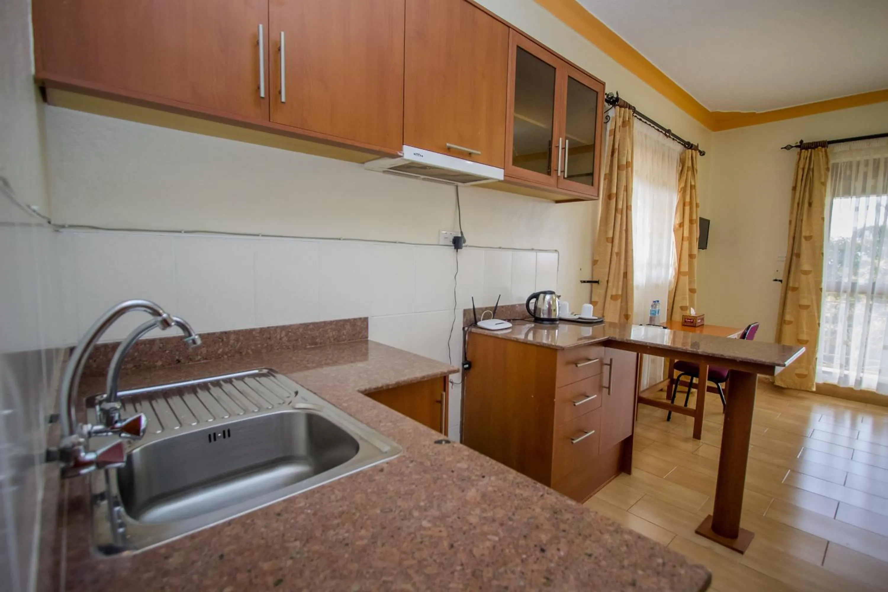 Kitchen or kitchenette in Askay Hotel Suites