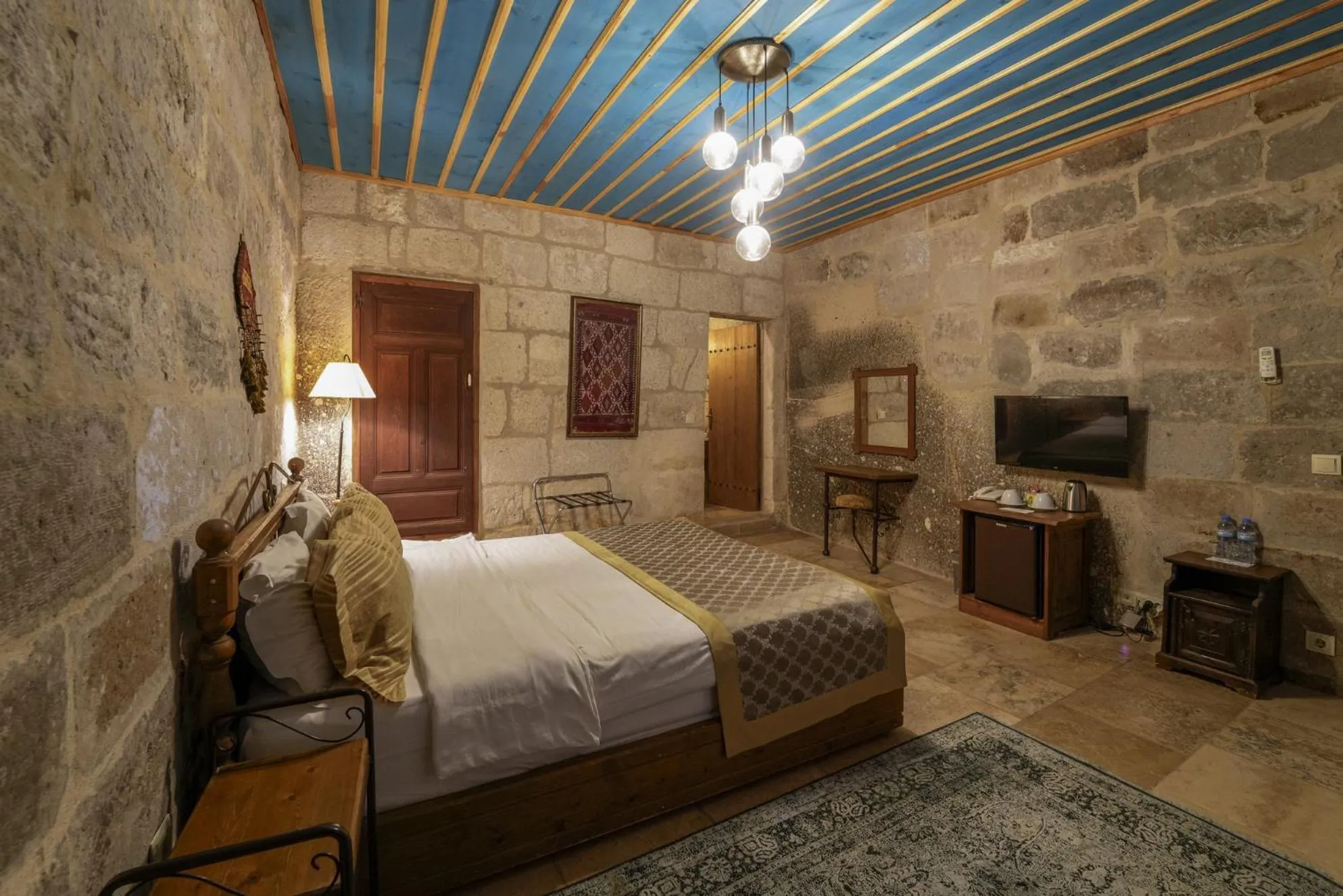 Bed in Tekkaya Cave Hotel