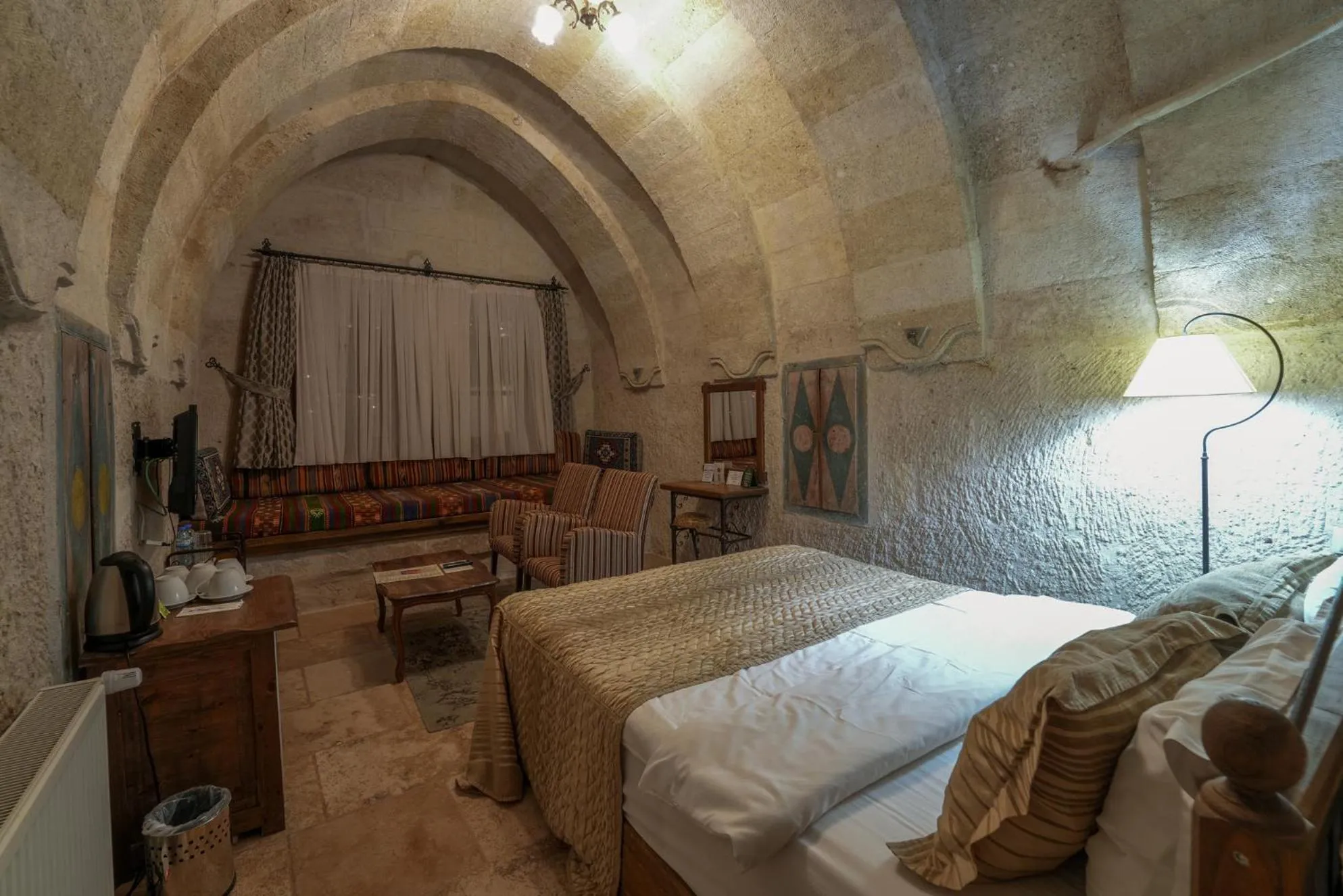 Bed in Tekkaya Cave Hotel