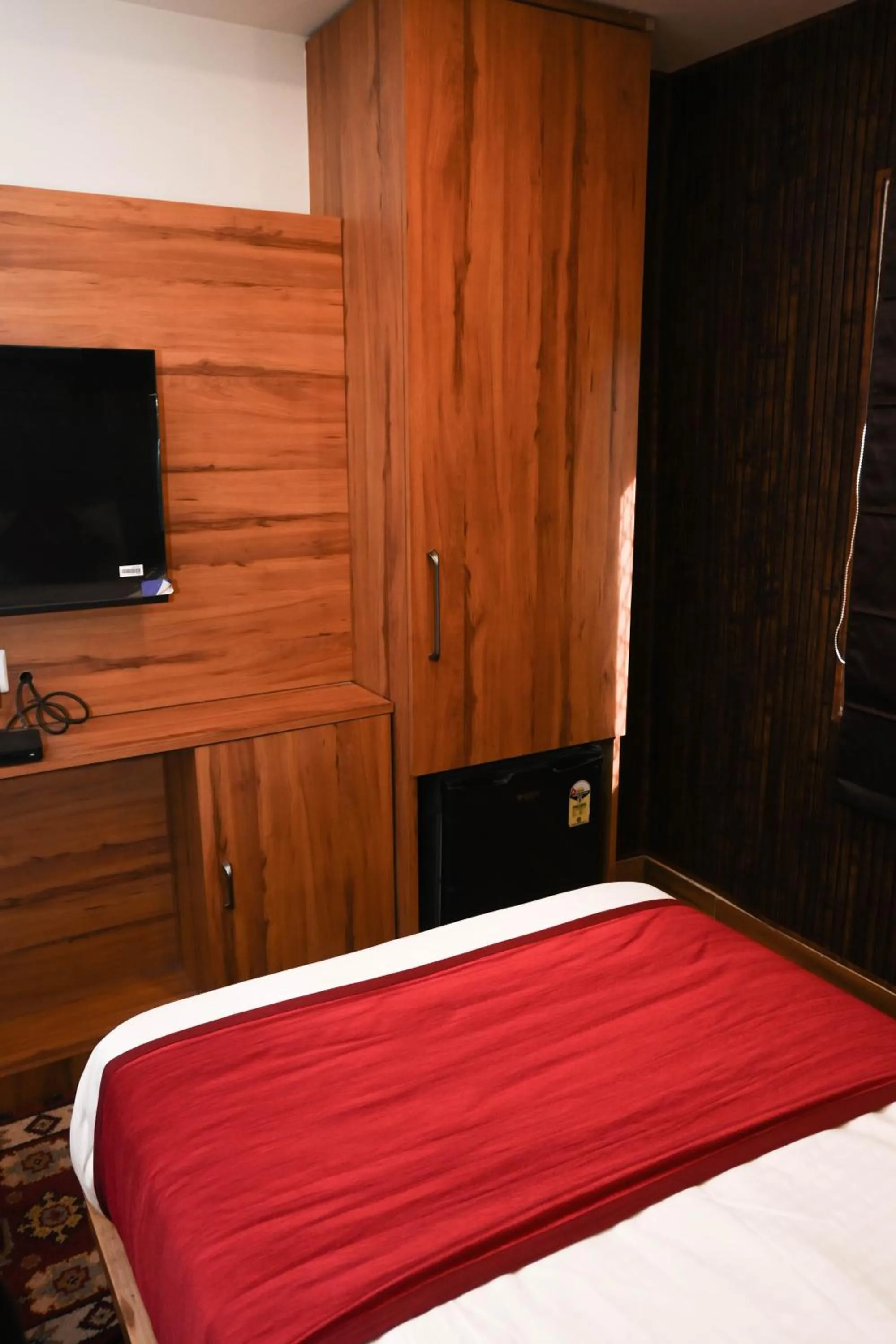 Bed in Hotel Siddhant Palace