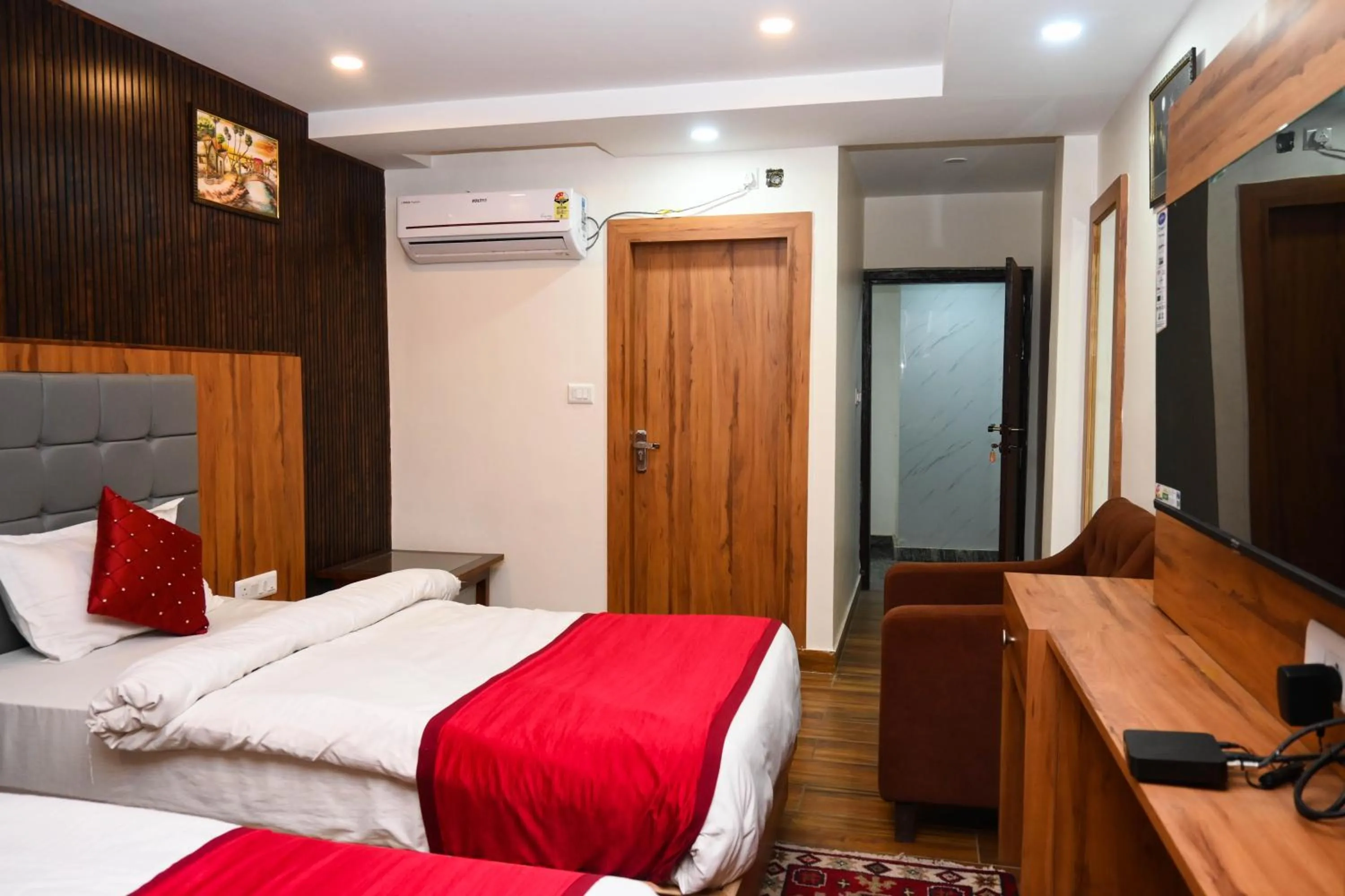 Bed in Hotel Siddhant Palace
