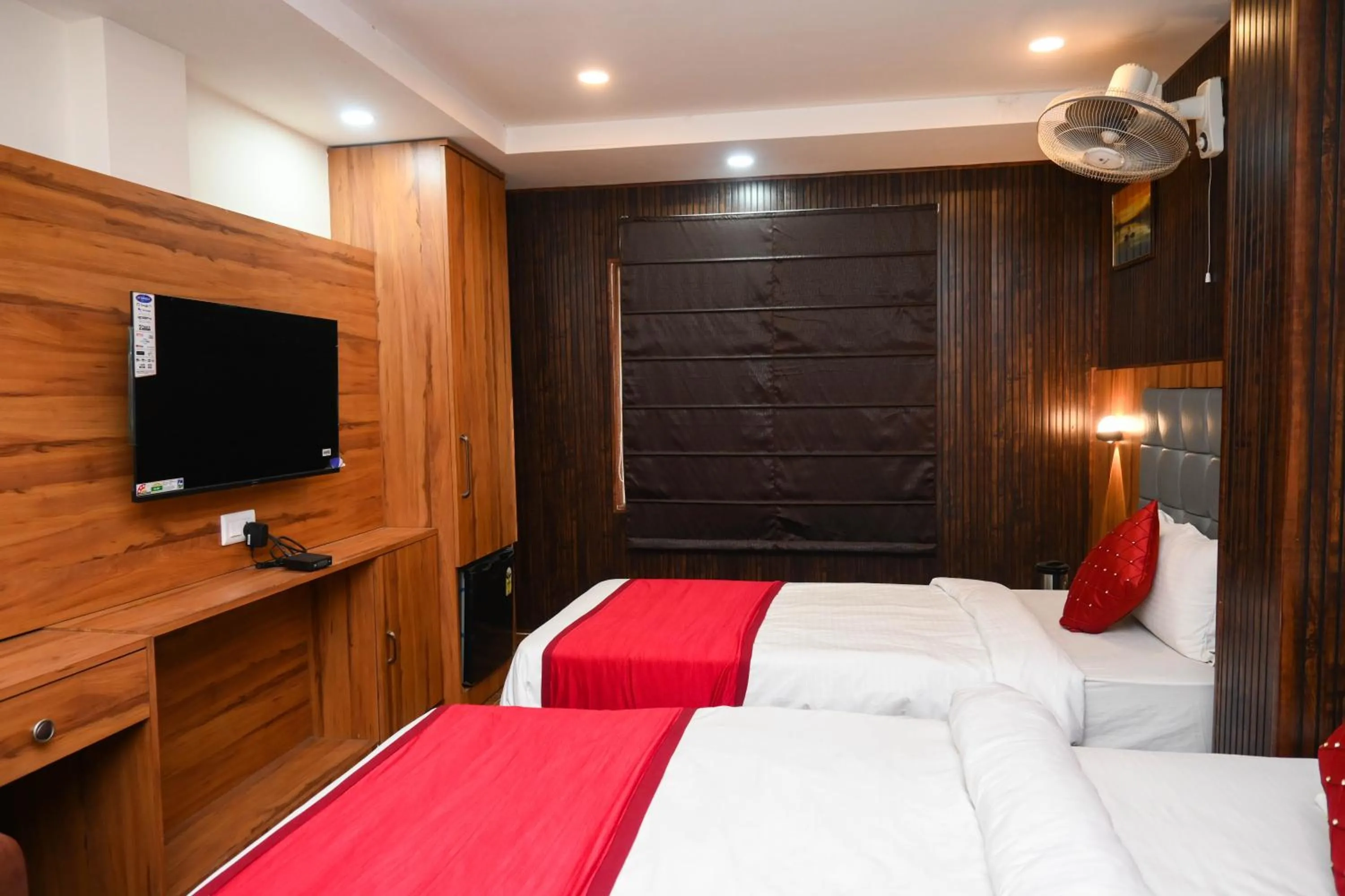 Bed in Hotel Siddhant Palace