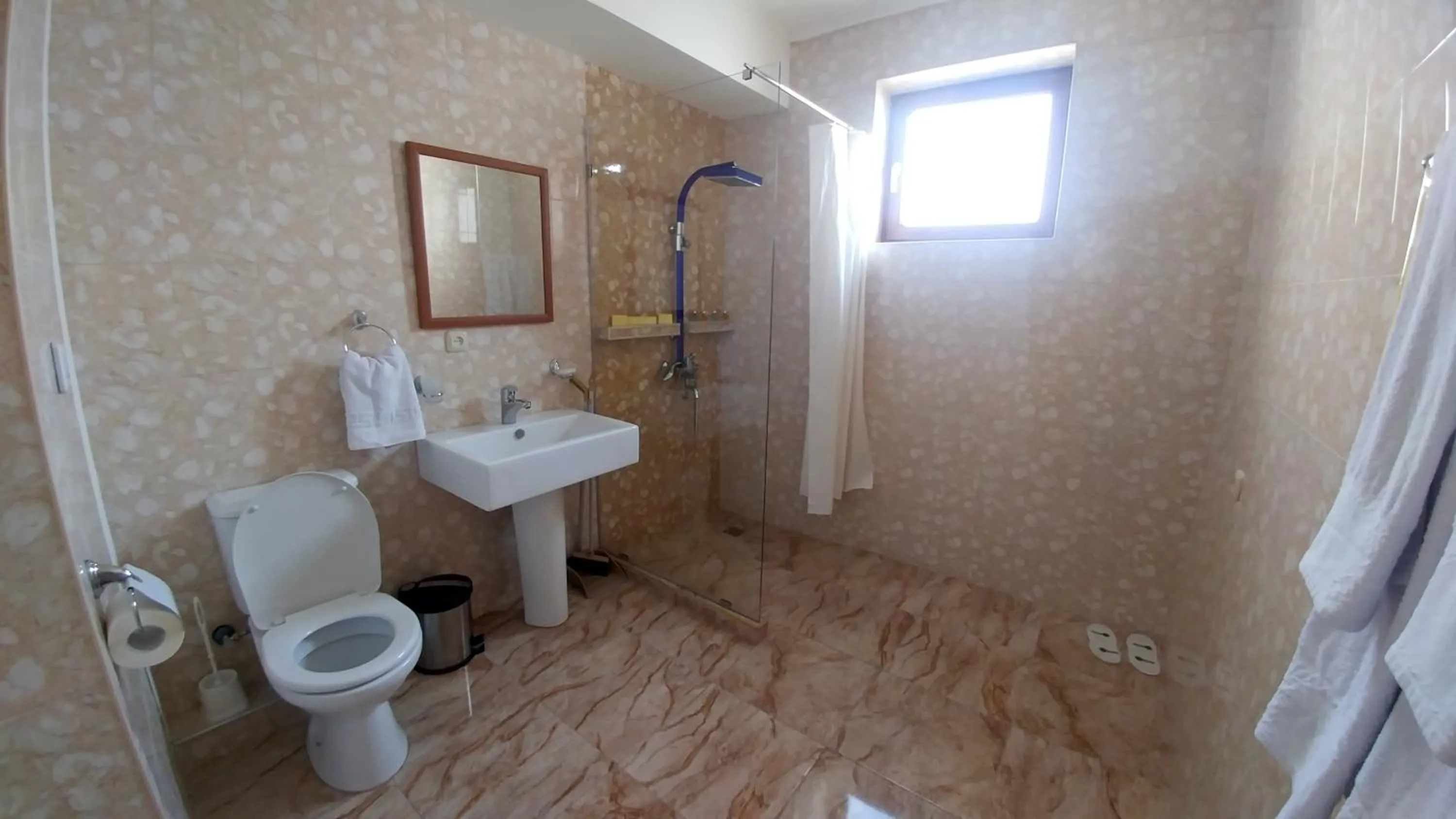 Shower in Cross Apartments and Tours