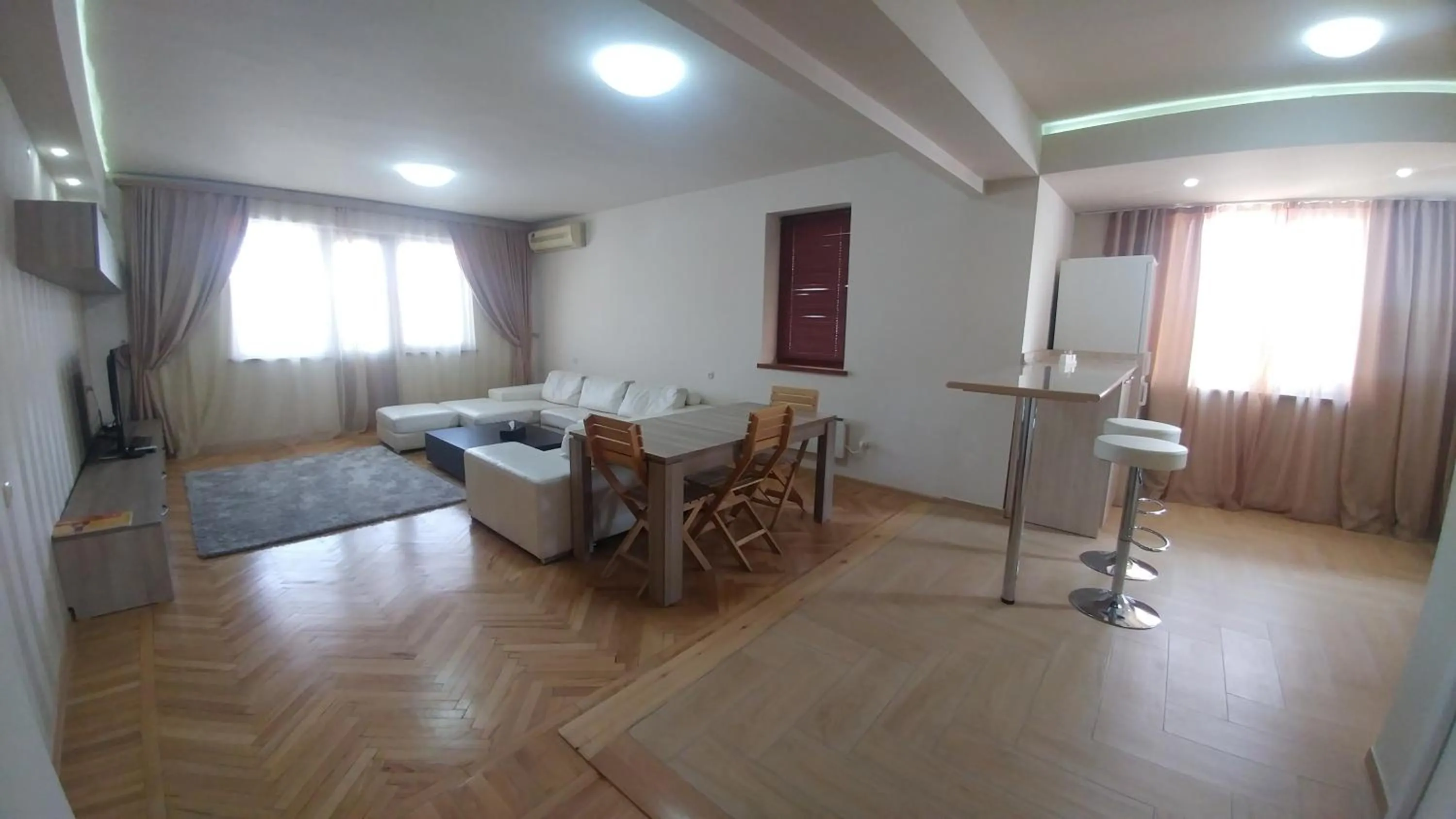 Living room in Cross Apartments and Tours