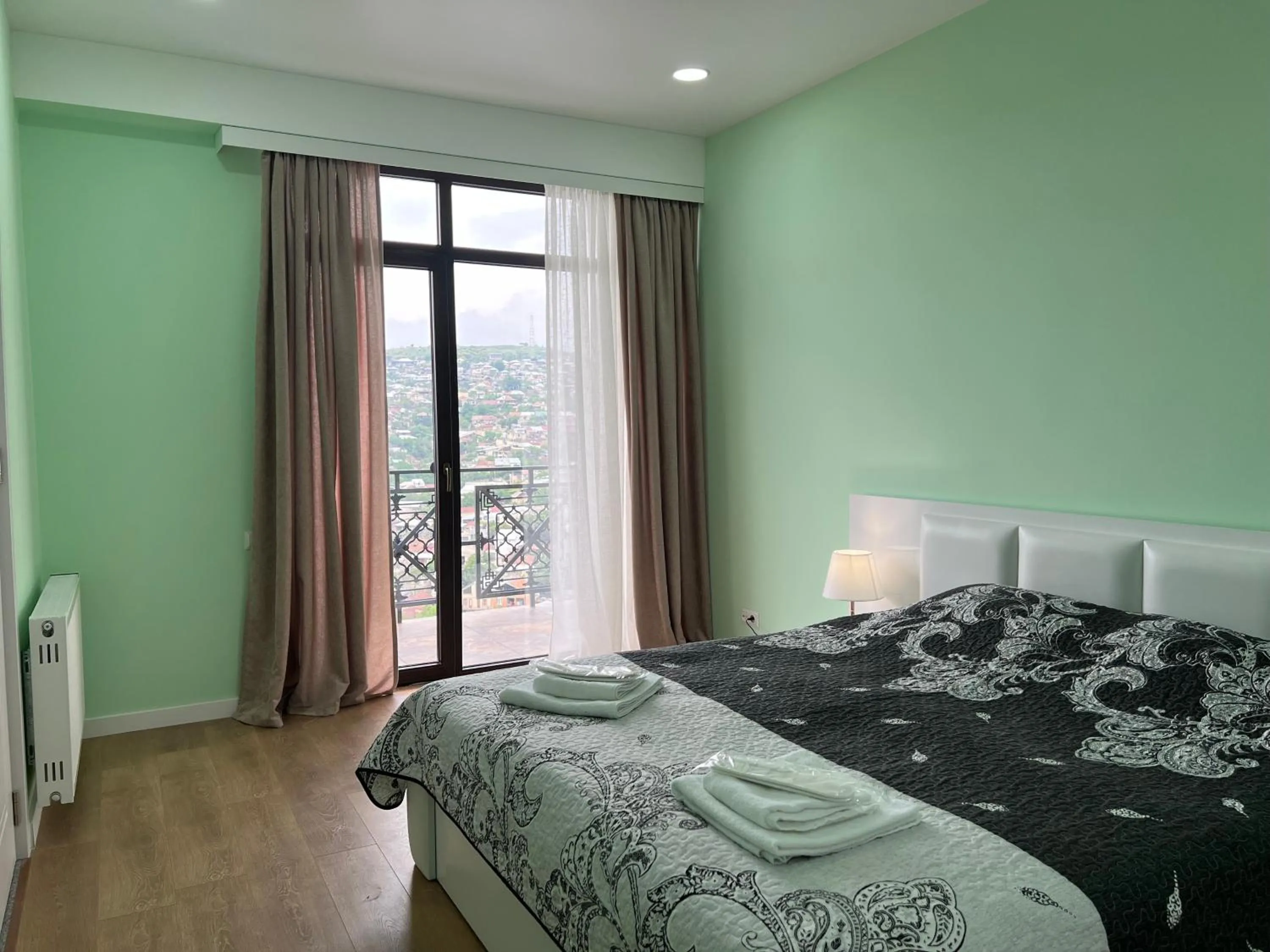 Bed in Panorama Hills Apart-Hotel