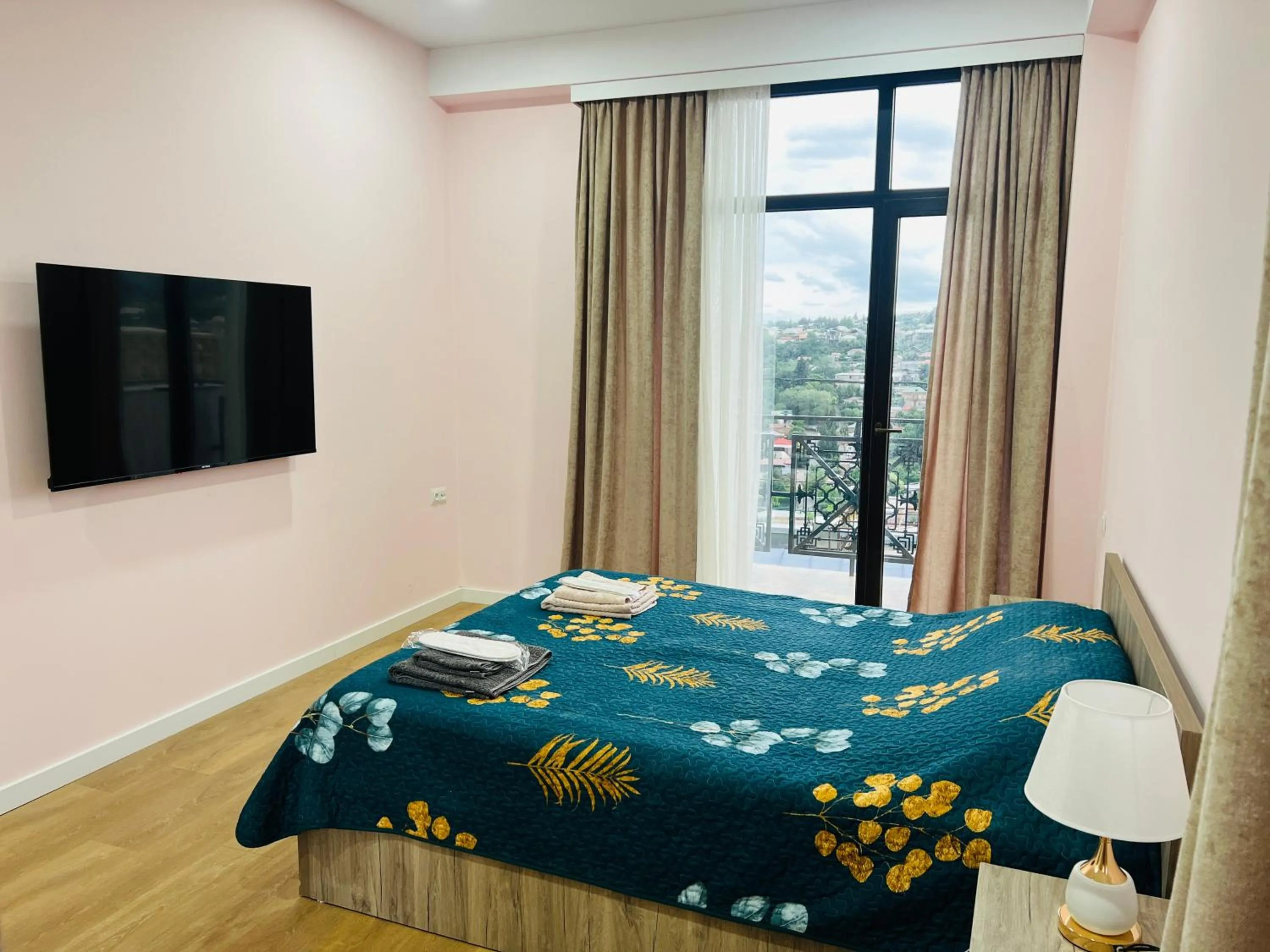 Bed in Panorama Hills Apart-Hotel