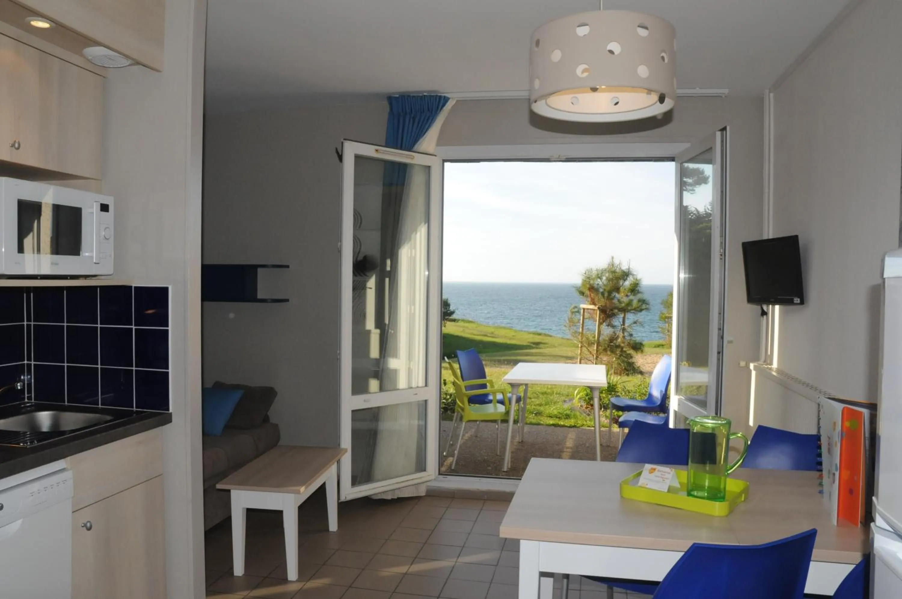 Dining area in VVF La côte d'Emeraude Saint-Cast-le-Guildo