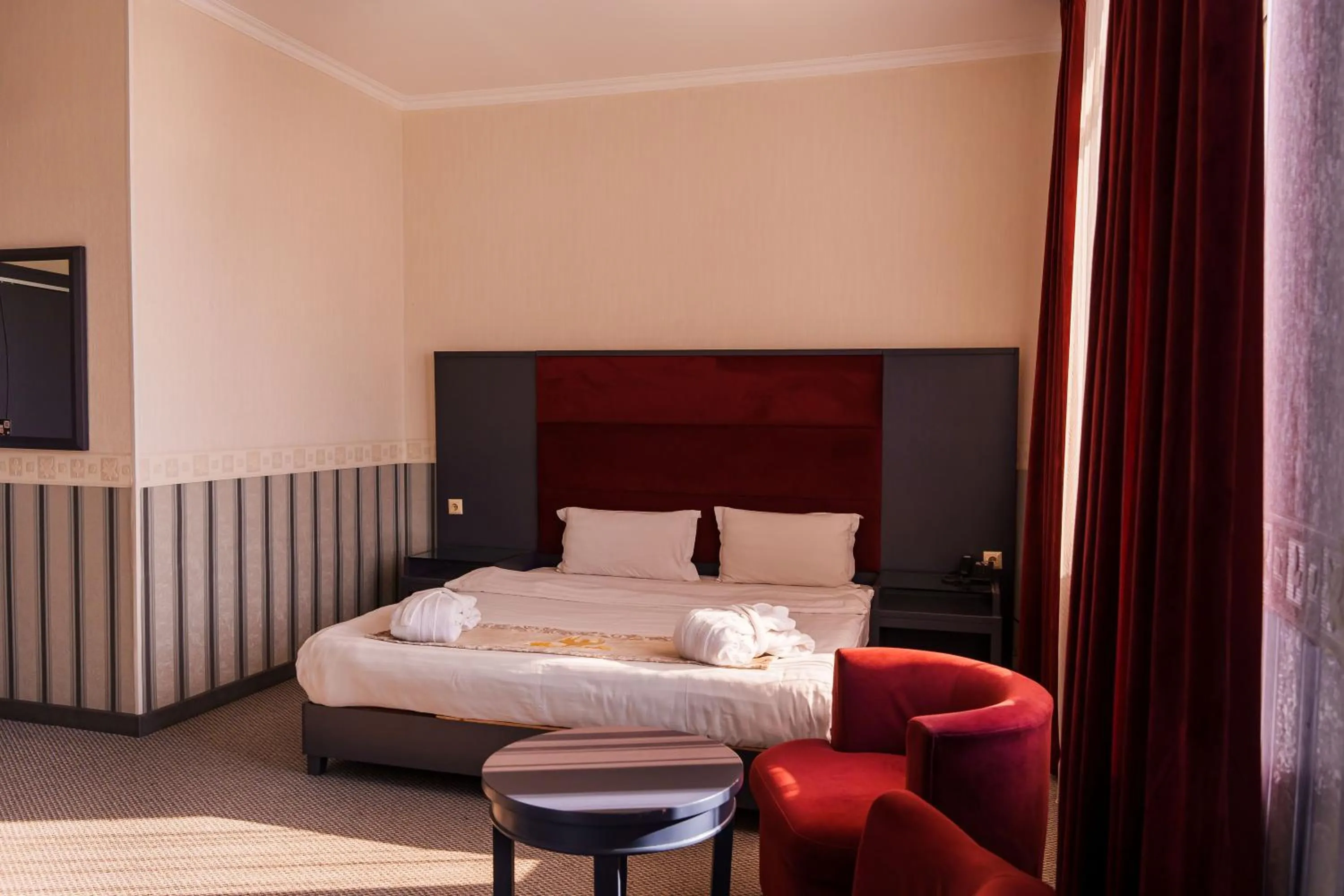 Photo of the whole room in Almaty Grand Erbil Hotel