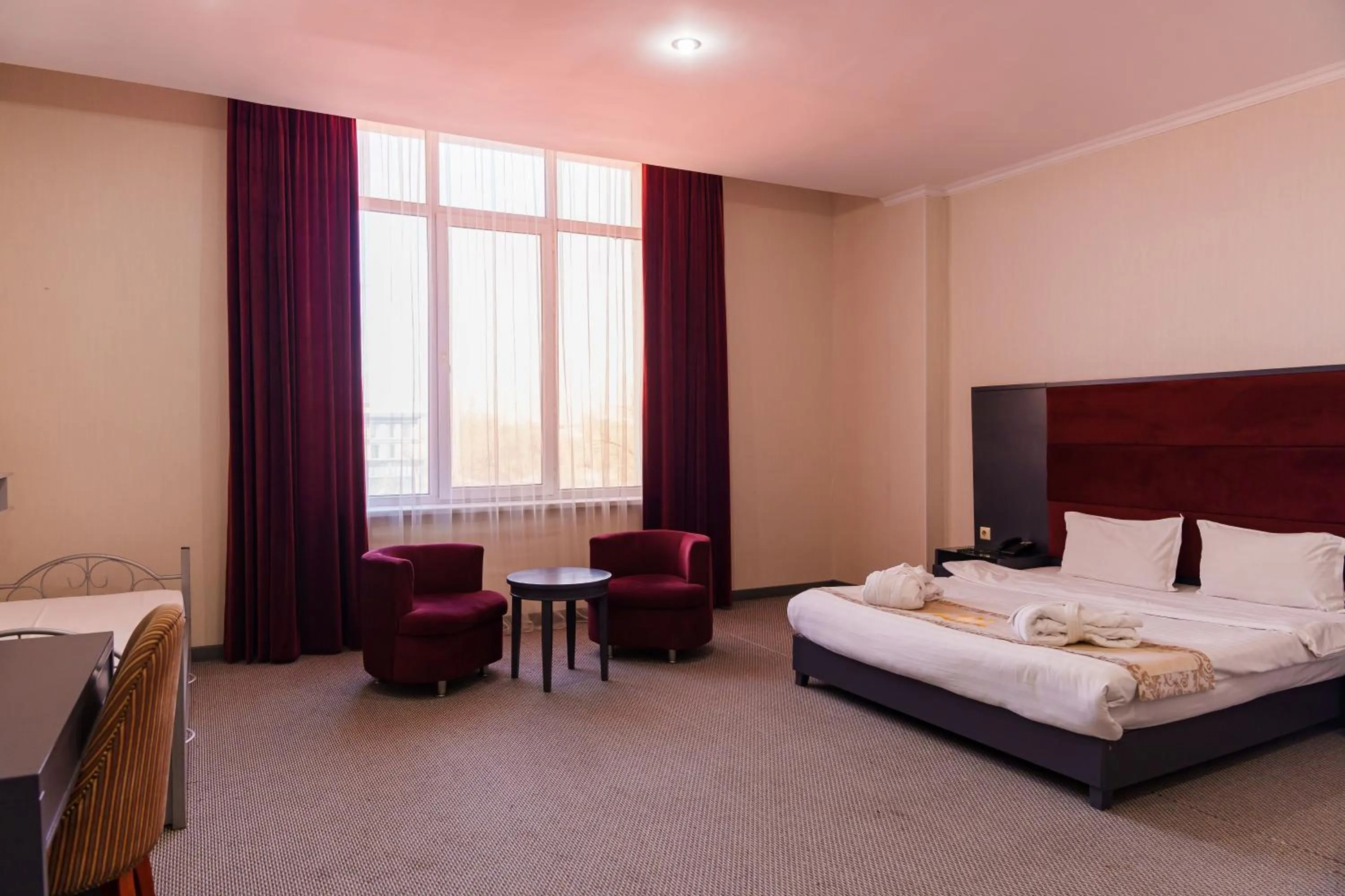Photo of the whole room in Almaty Grand Erbil Hotel