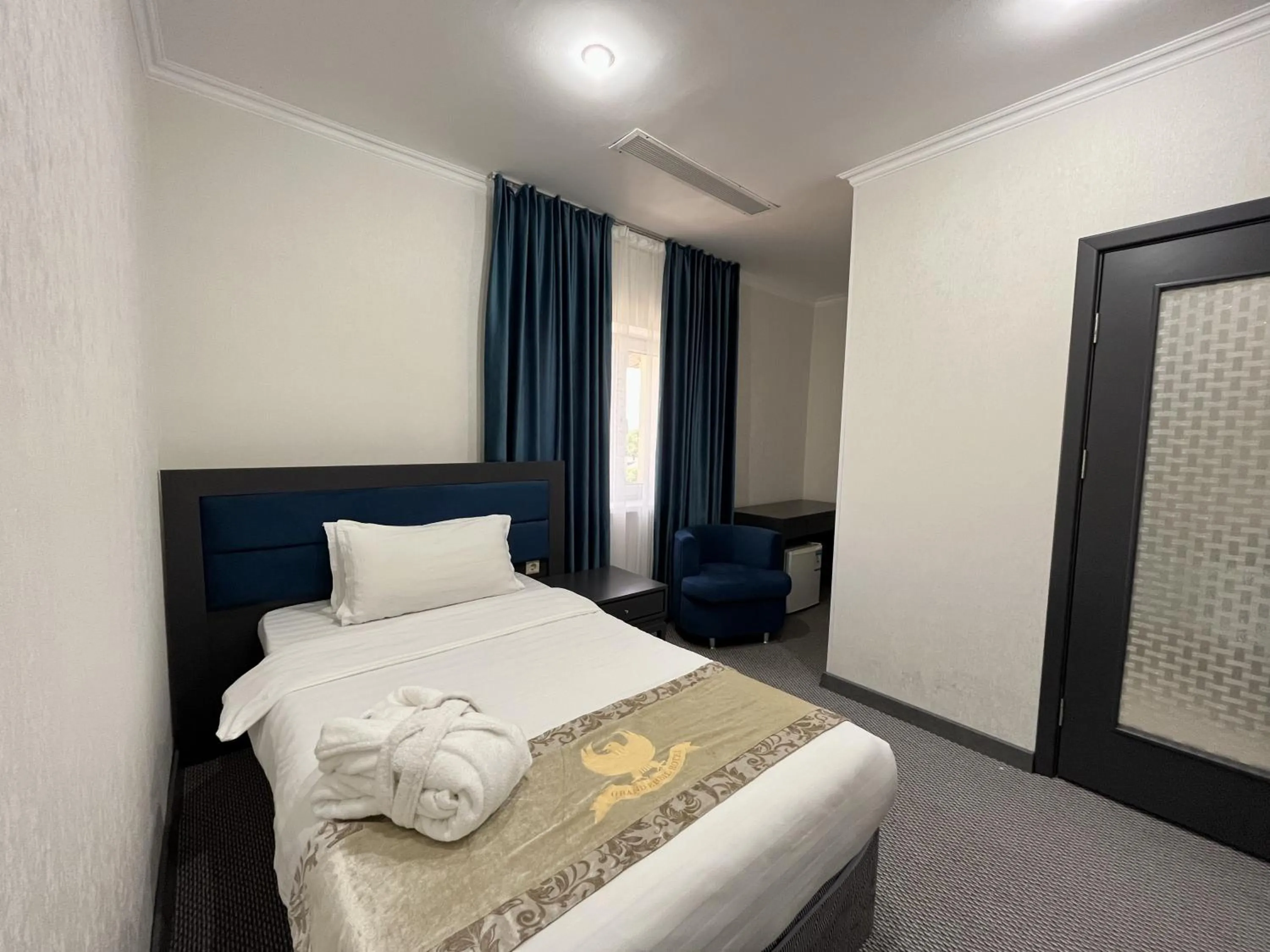 Photo of the whole room in Almaty Grand Erbil Hotel