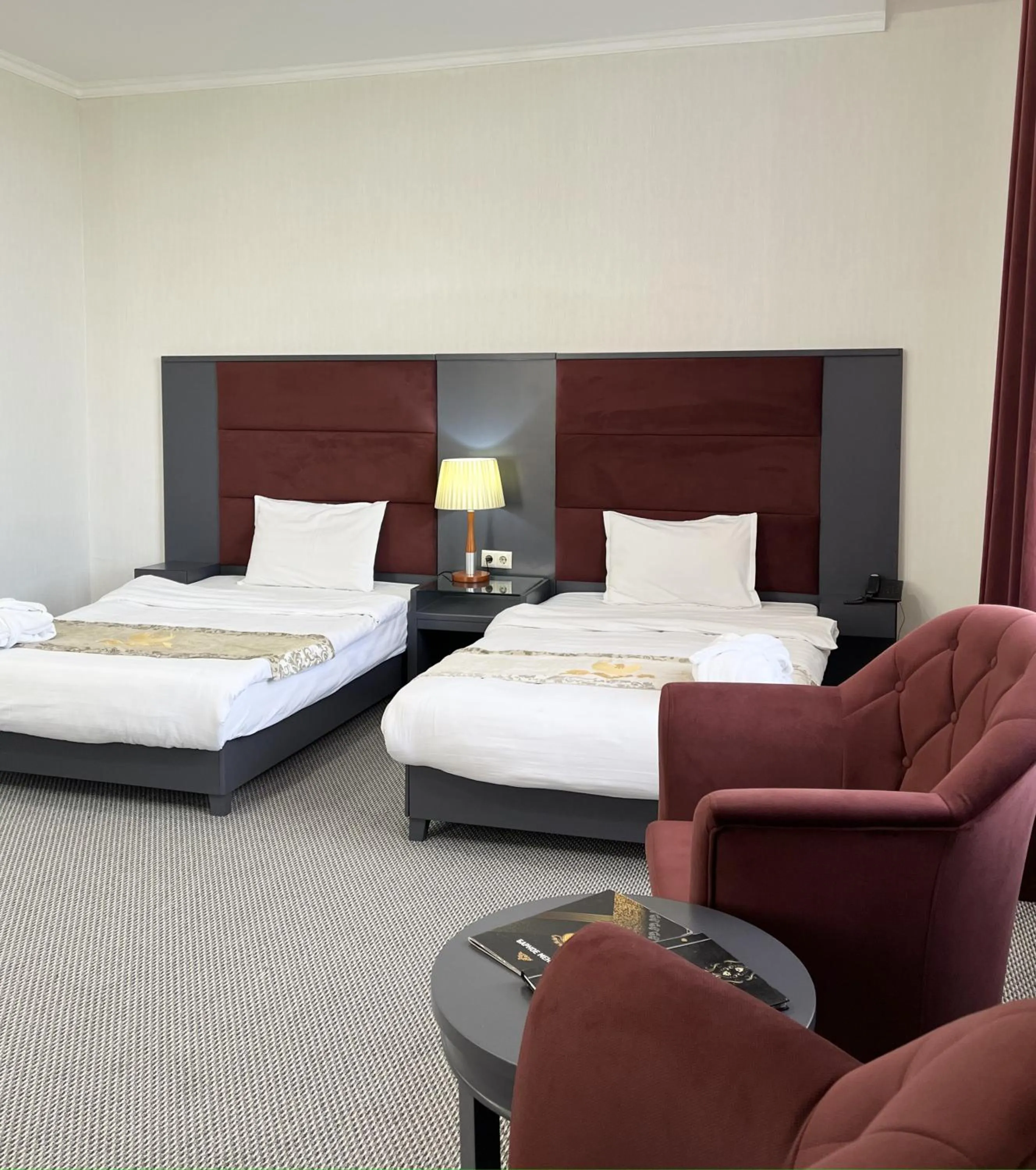 Photo of the whole room in Almaty Grand Erbil Hotel