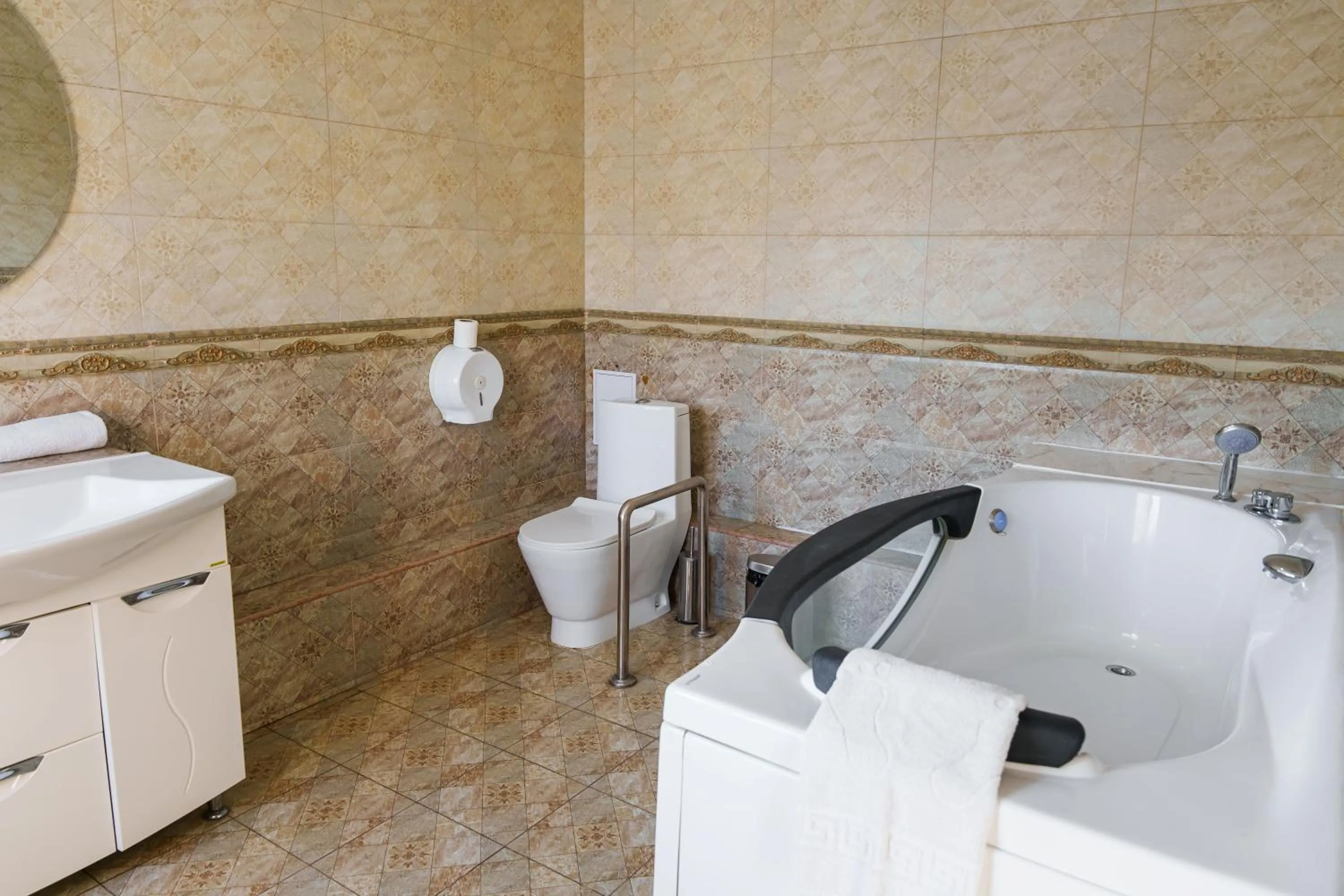 Bathroom in Almaty Grand Erbil Hotel