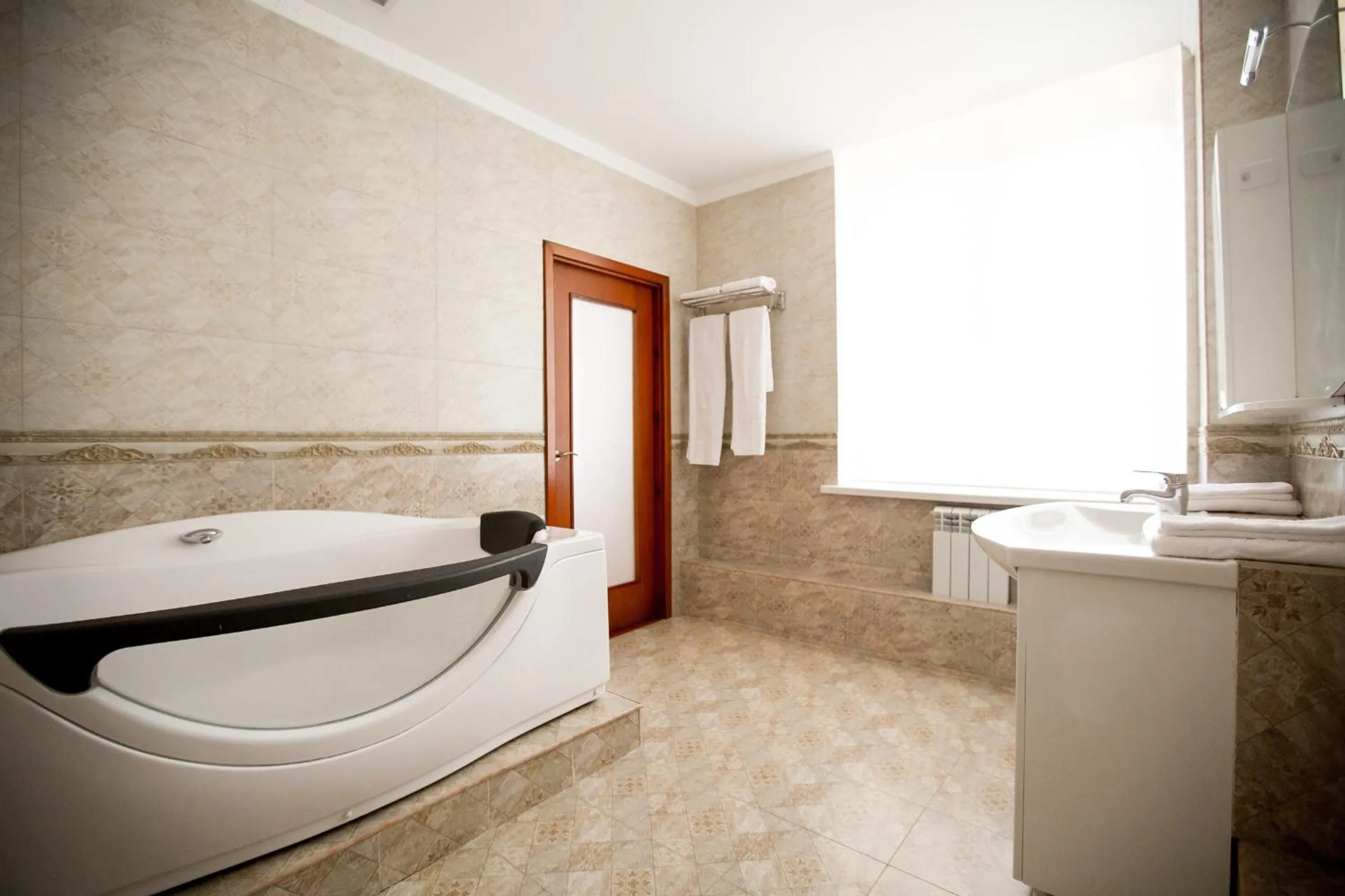 Bathroom in Almaty Grand Erbil Hotel