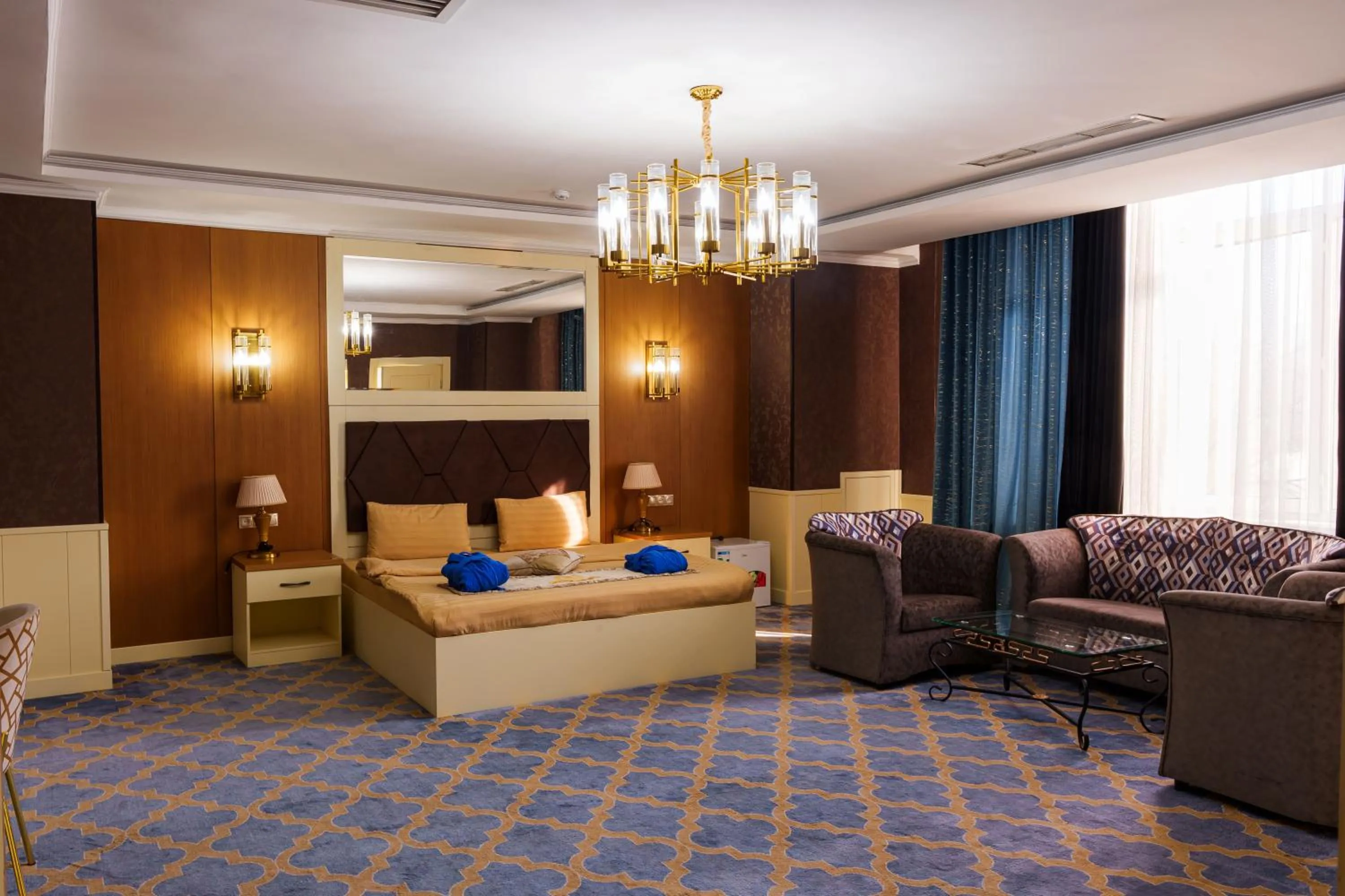 Photo of the whole room in Almaty Grand Erbil Hotel