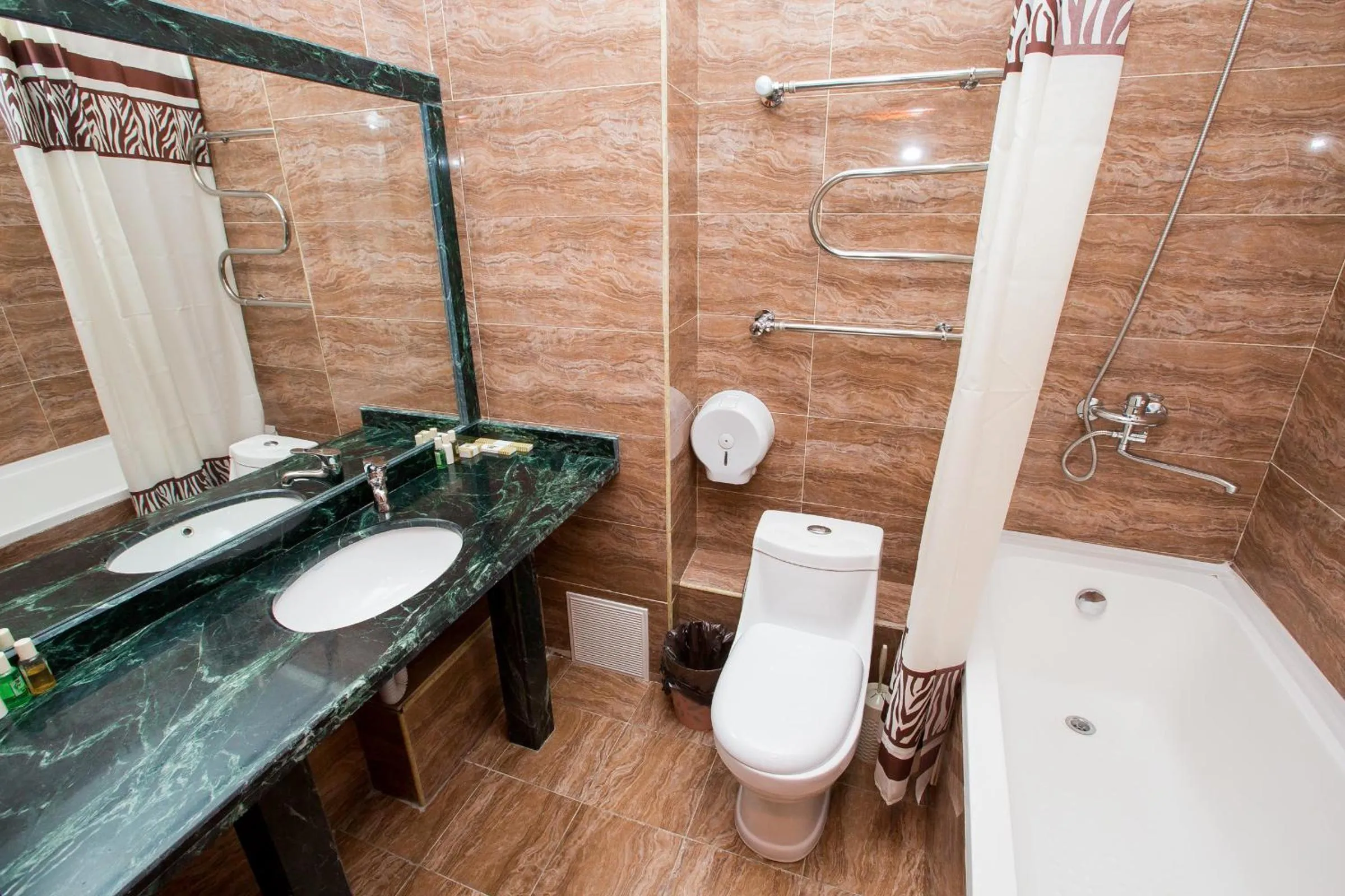 Bathroom in Almaty Grand Erbil Hotel