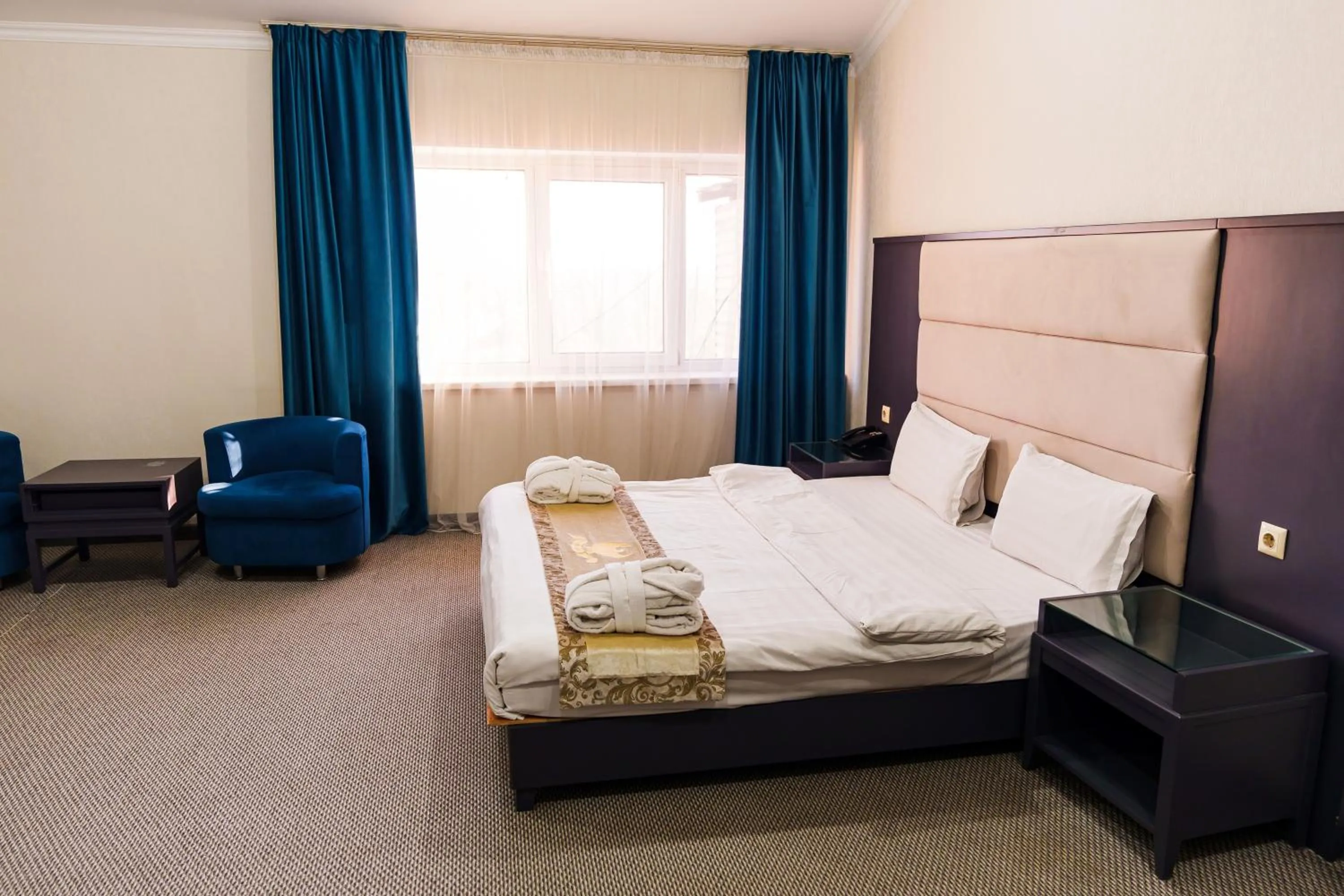 Photo of the whole room in Almaty Grand Erbil Hotel