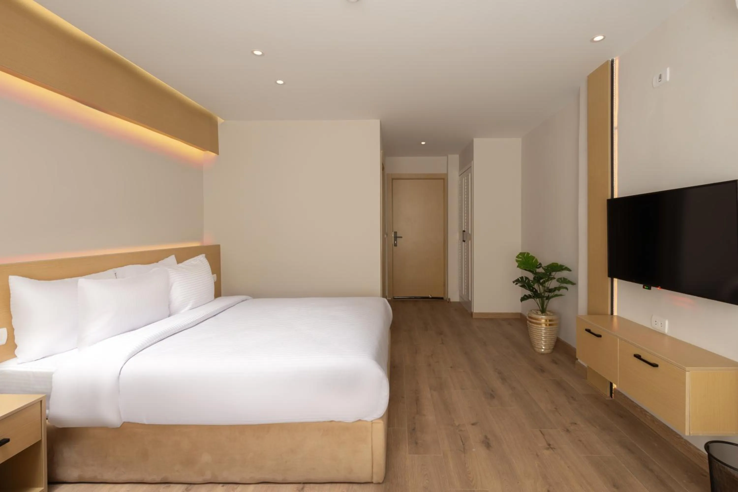 Bed in Elegance Grand City Hotel