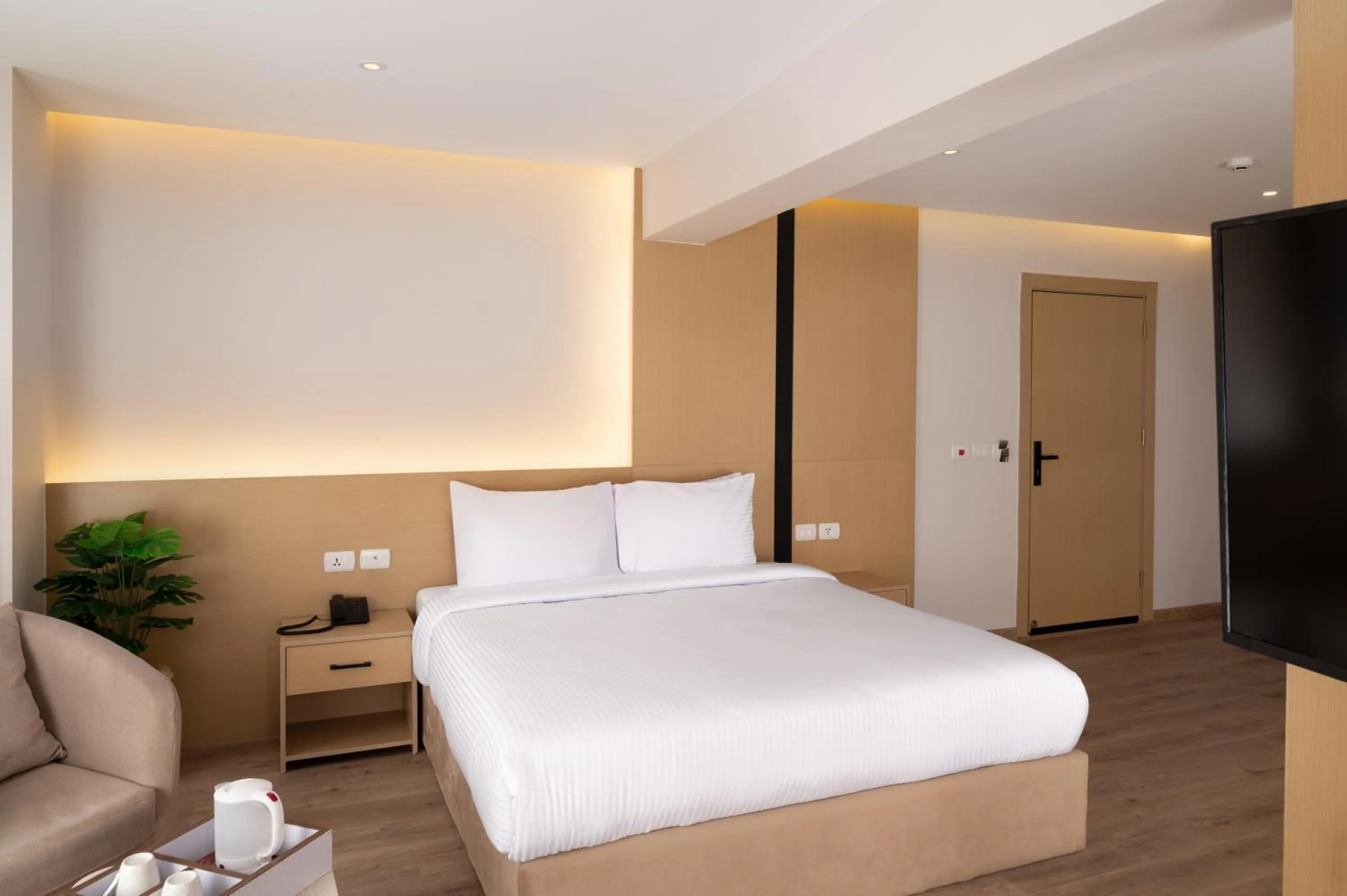 Bed in Elegance Grand City Hotel