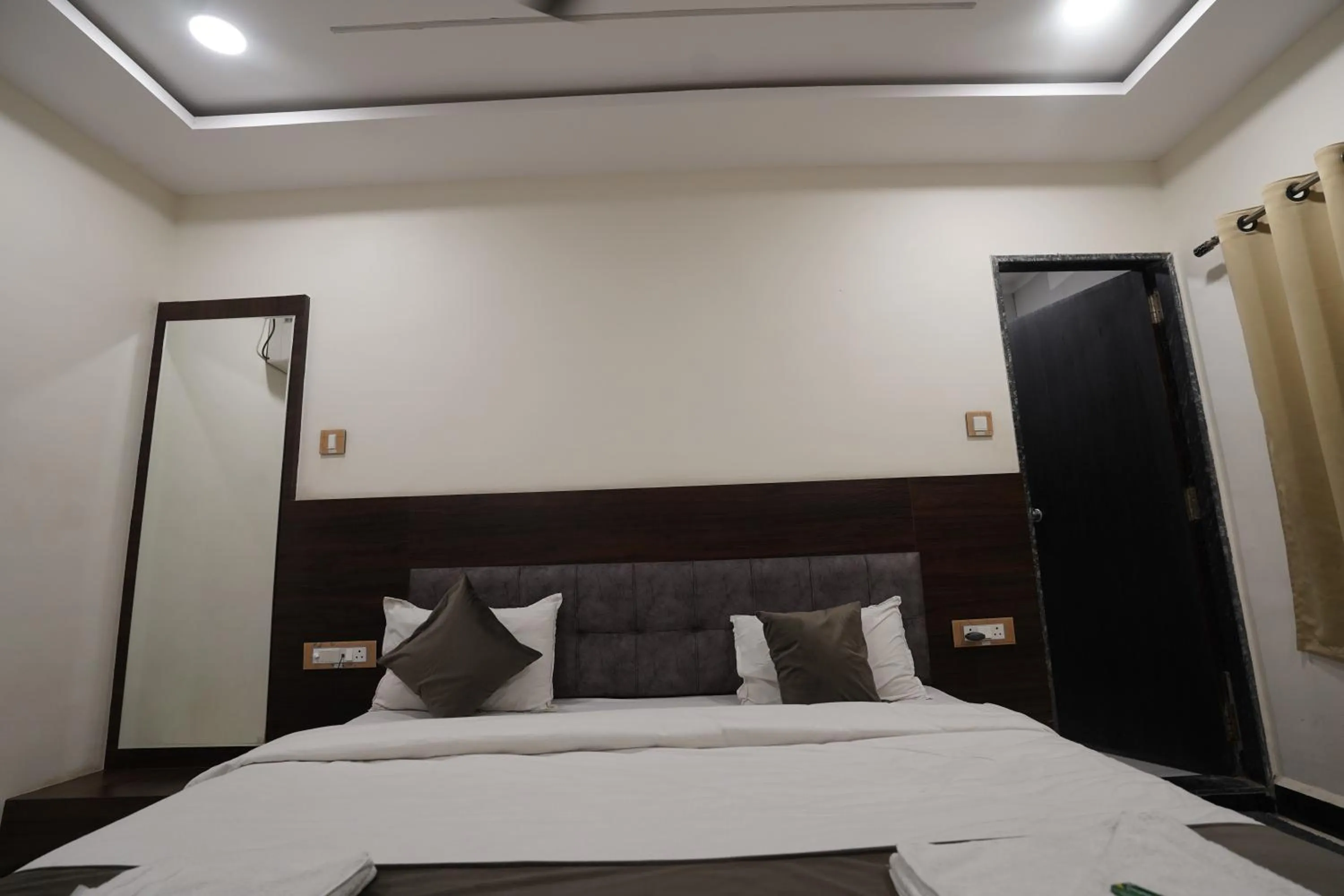 Bed in Hotel Dev Kripa