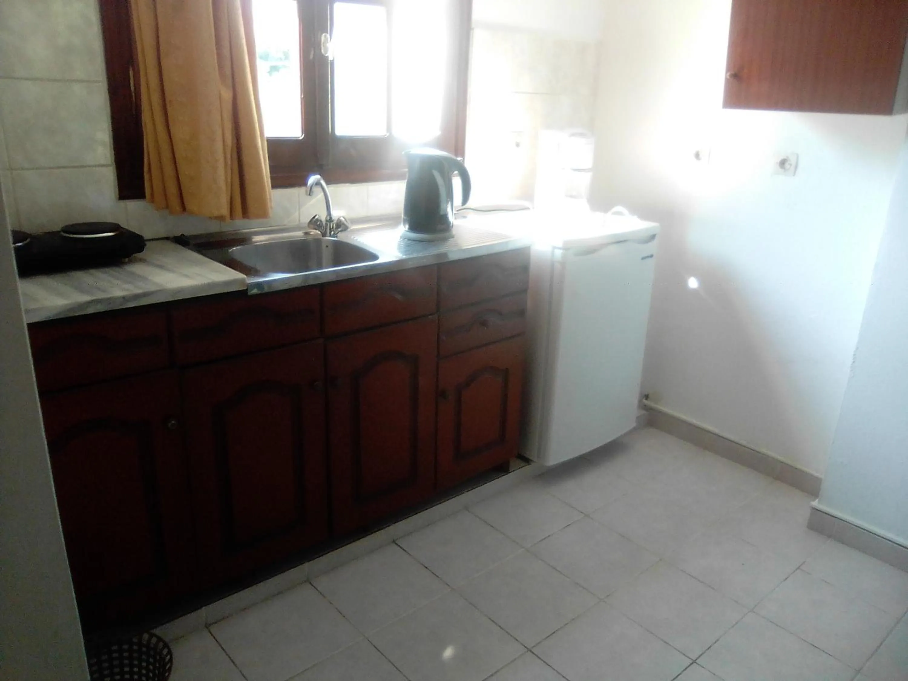 Kitchen or kitchenette in Georgina Apartments