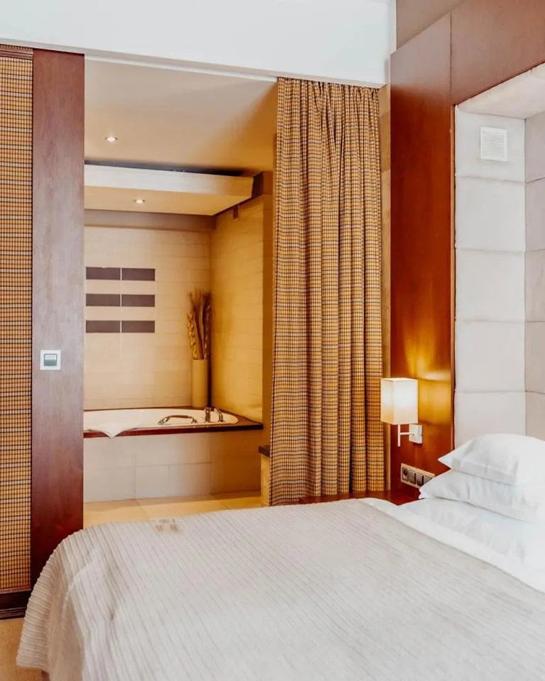 Bed in Grand Hotel Boutique