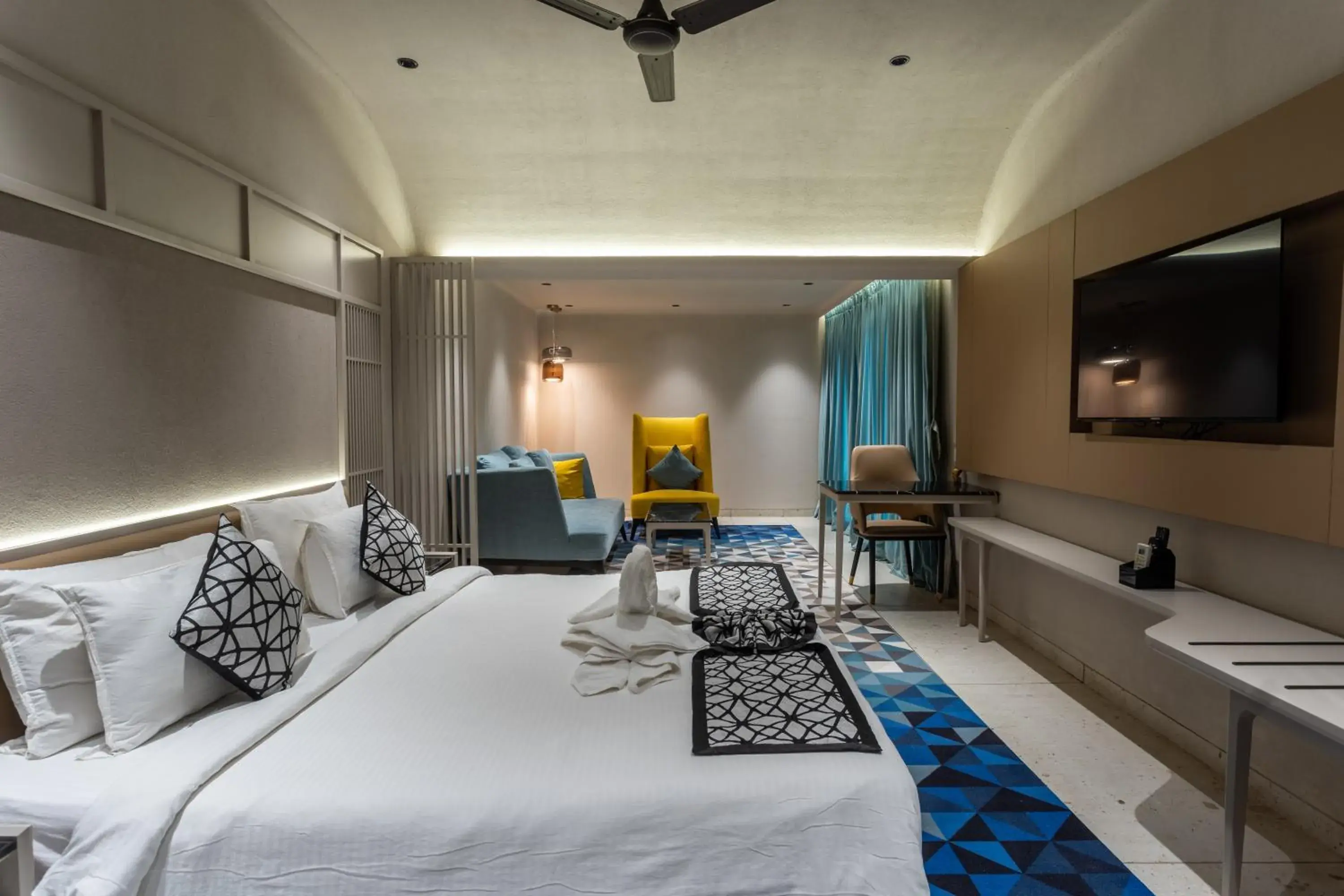 Double Room with Pool View in Treat Resort Silvassa Double Room with Pool View in Treat Resort Silvassa