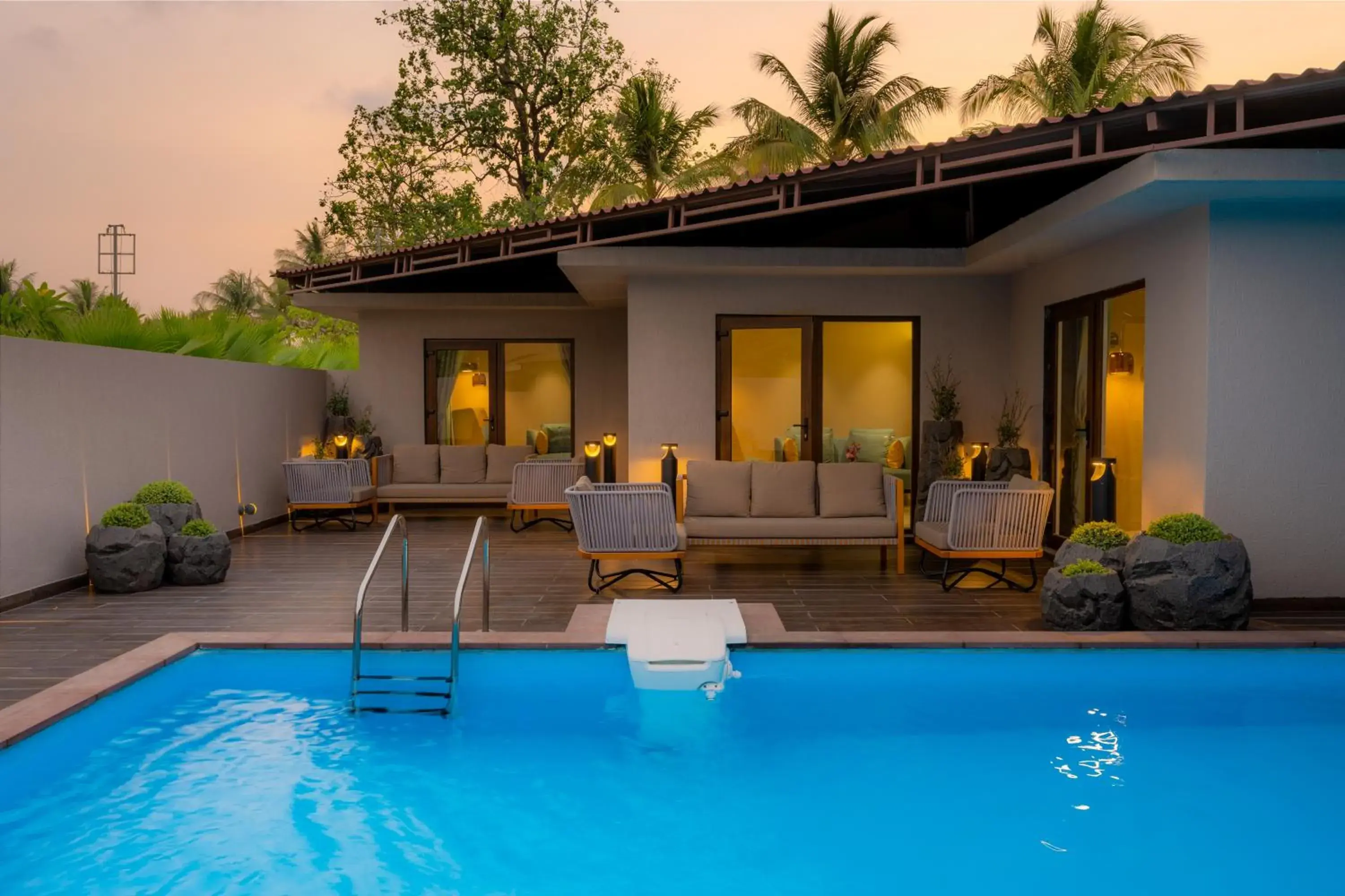 Double Room with Pool View in Treat Resort Silvassa Double Room with Pool View in Treat Resort Silvassa