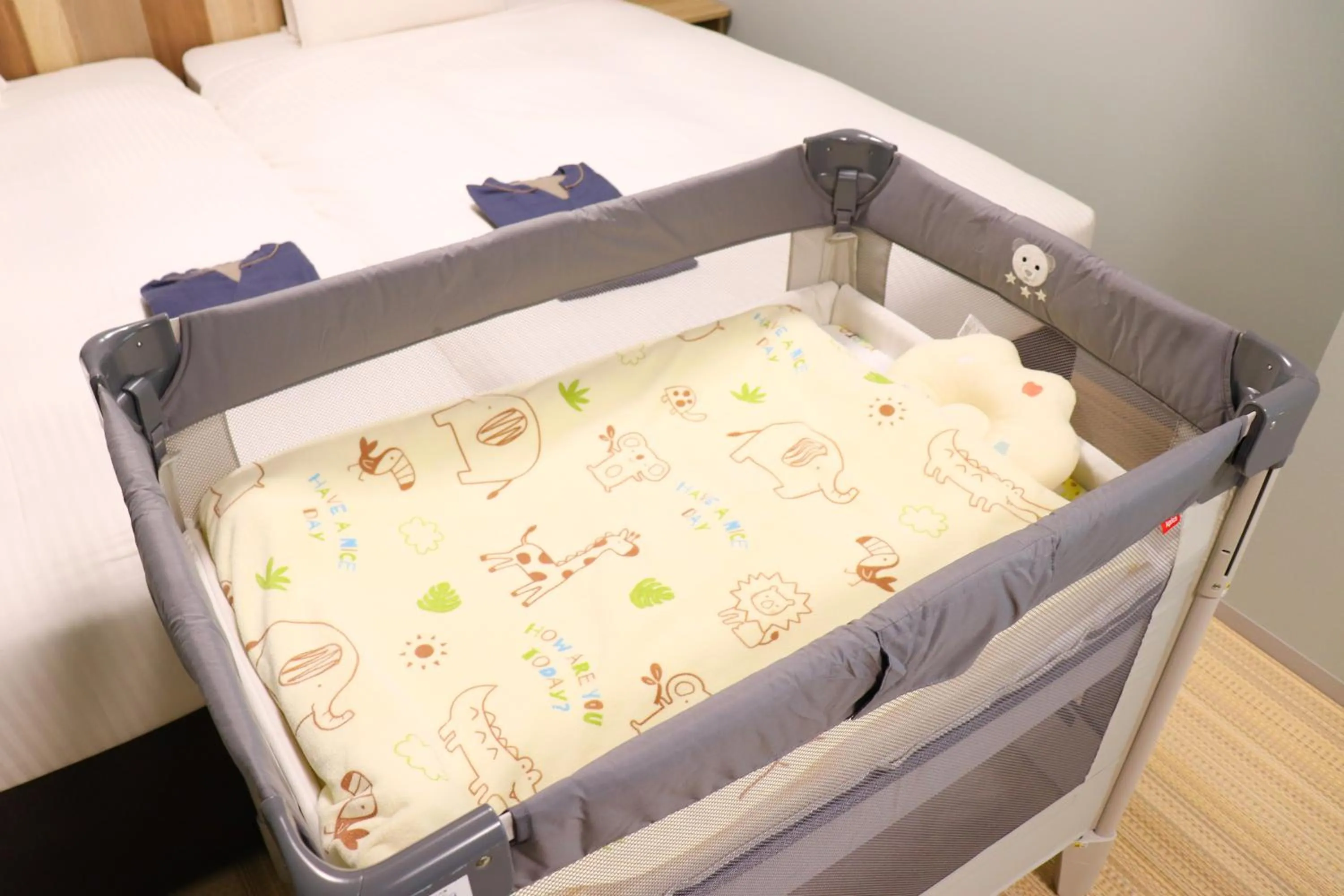 Bed in Hiyori Hotel Osaka Suminoekoen Station