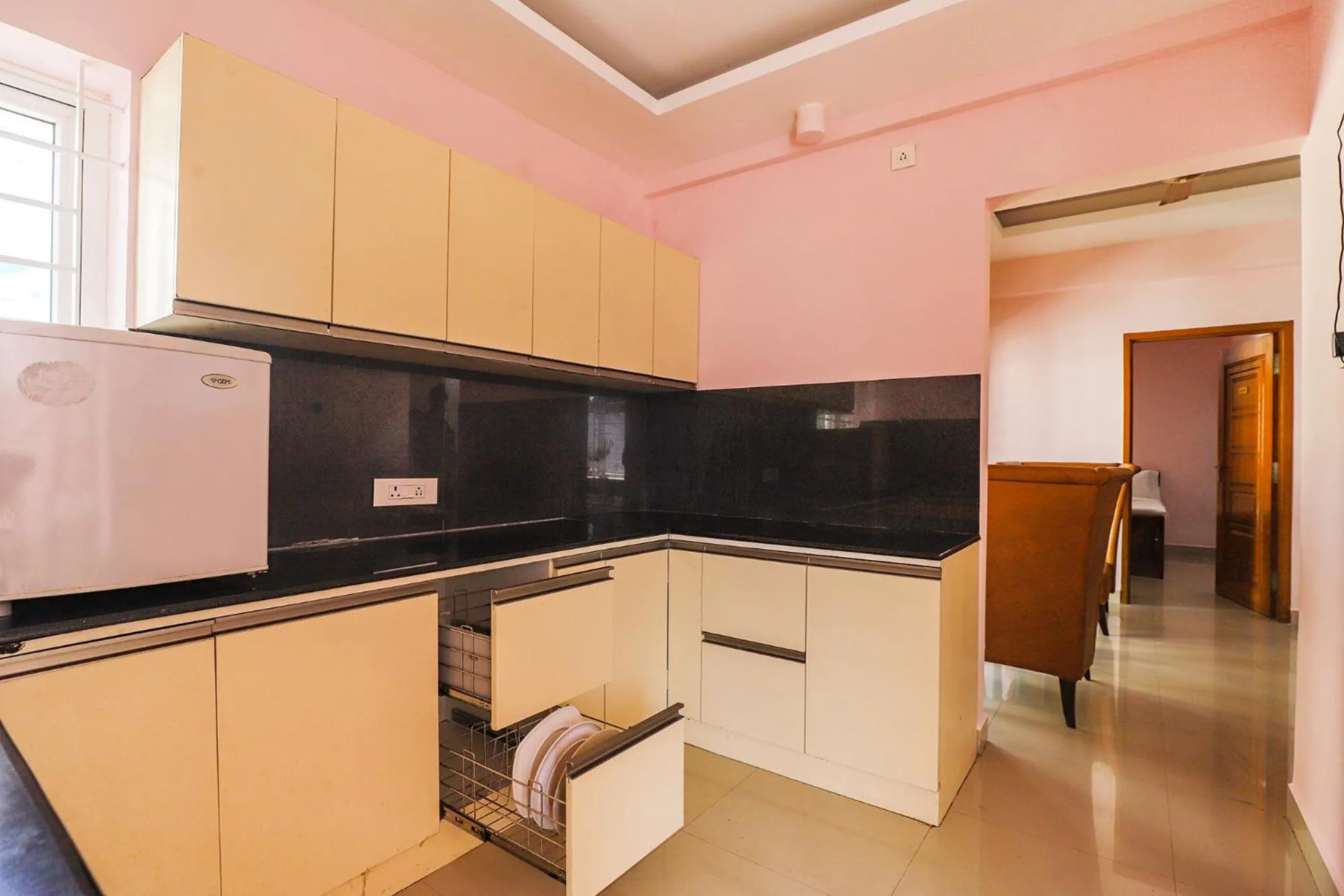 Kitchen or kitchenette in FabHotel Hathvik Park