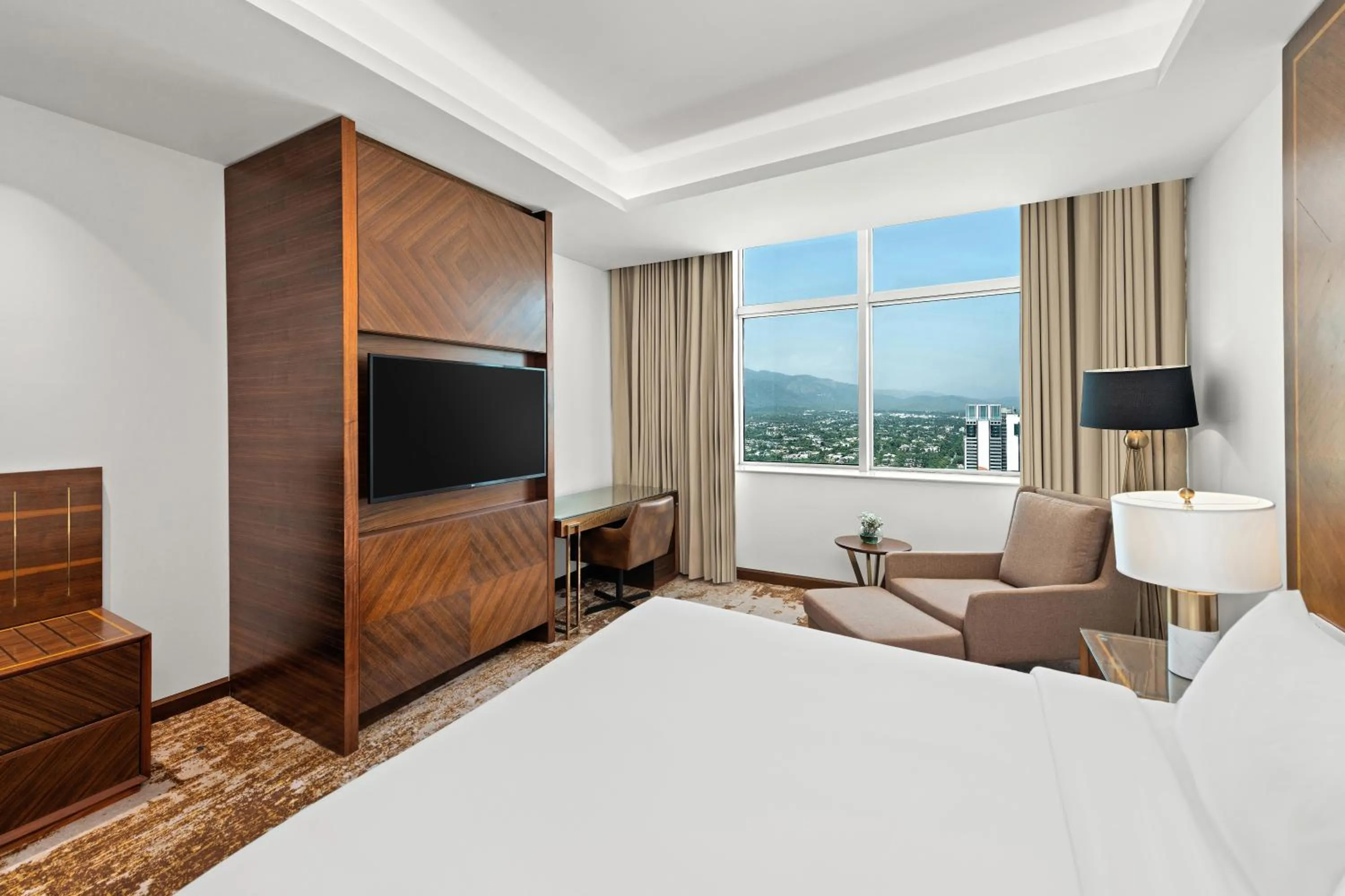 Bed in Movenpick Hotel Centaurus Islamabad