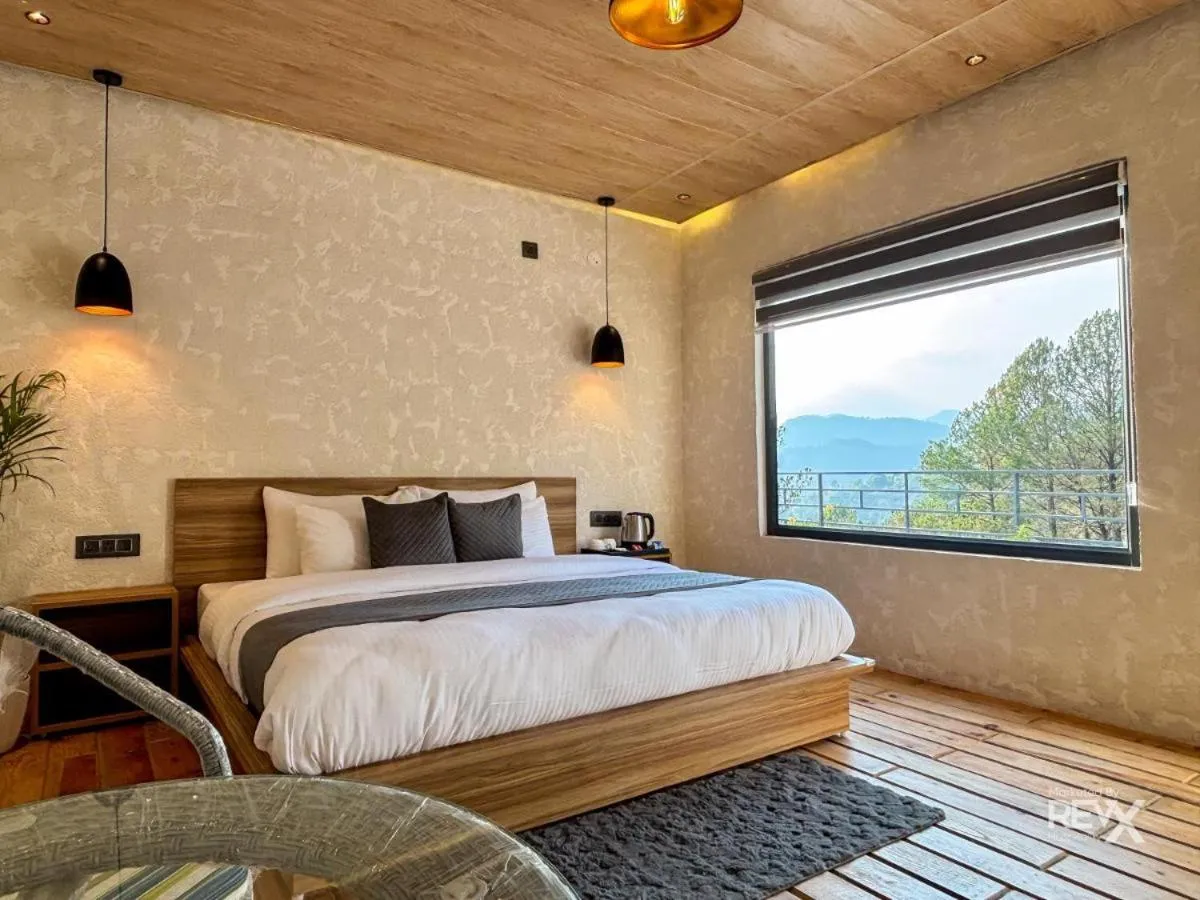 Bed in Anupraas Resort