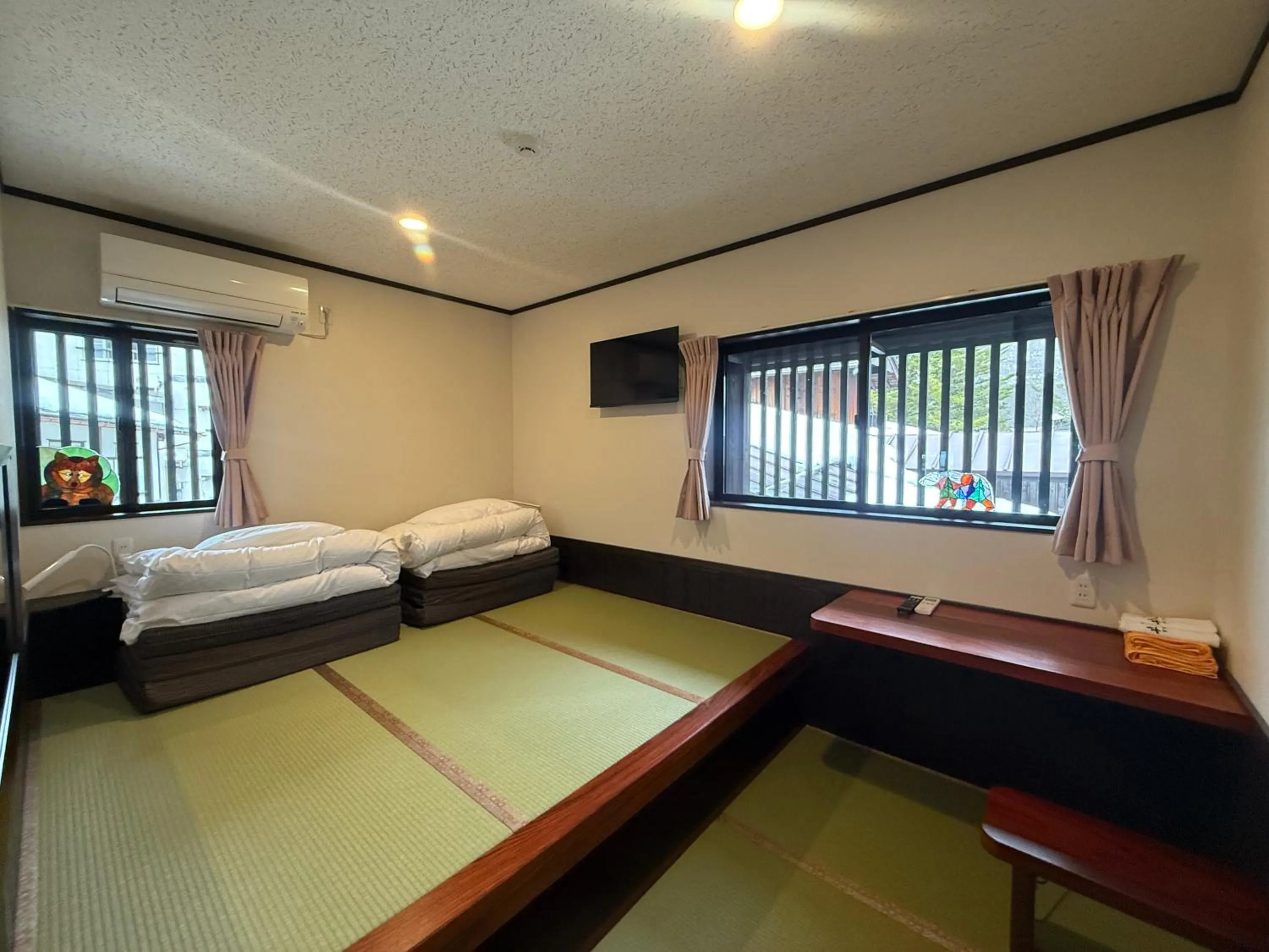 Bed in Tsuyukusa