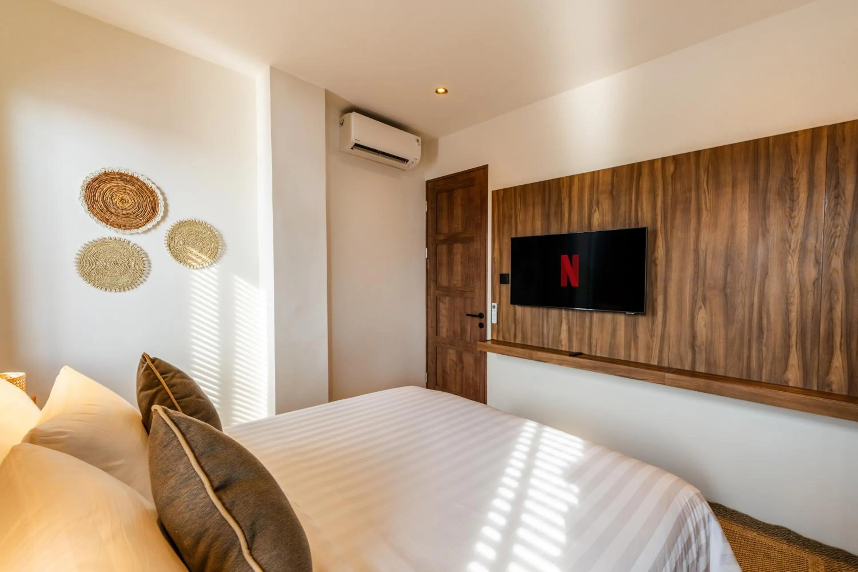 Bed in Avanya Luxury Apartment