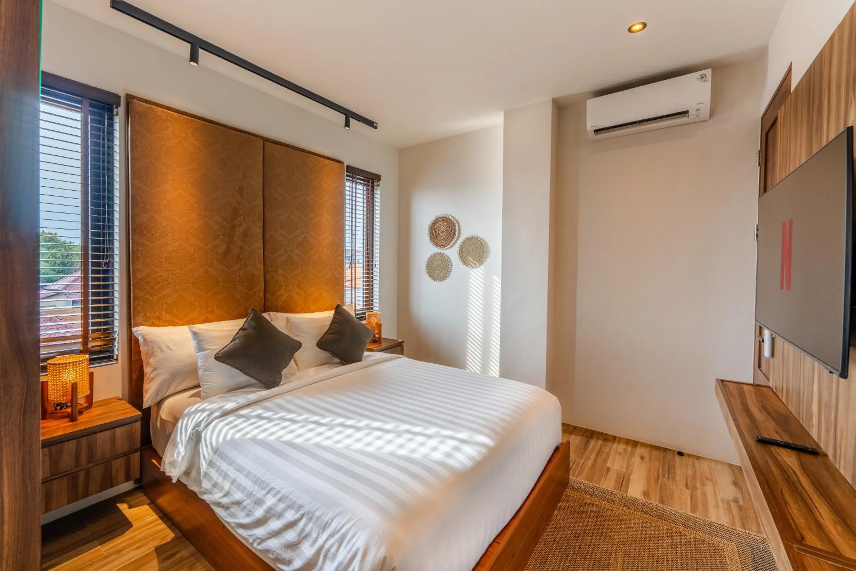 Bed in Avanya Luxury Apartment
