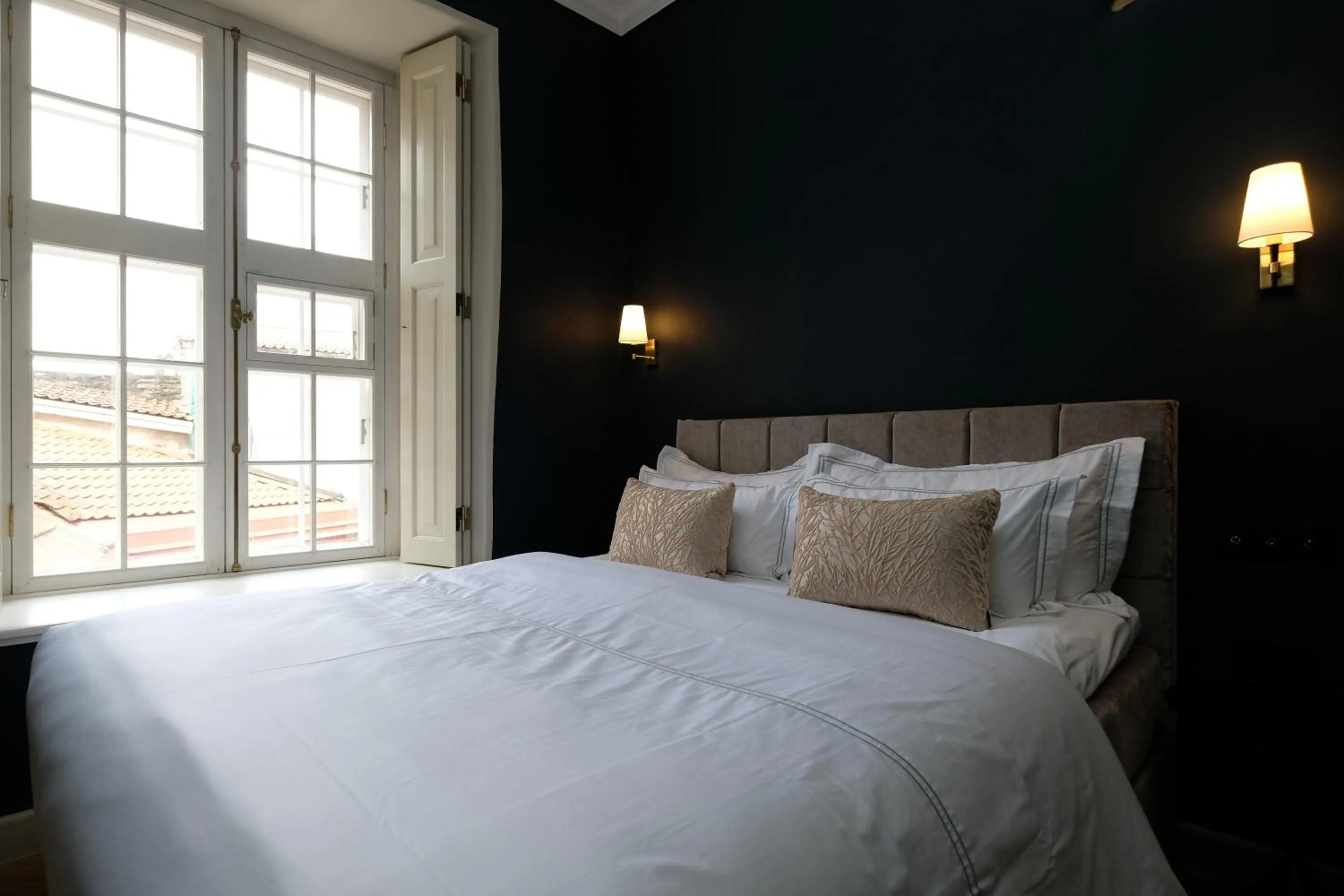 Bed in The Three Sisters Hotel