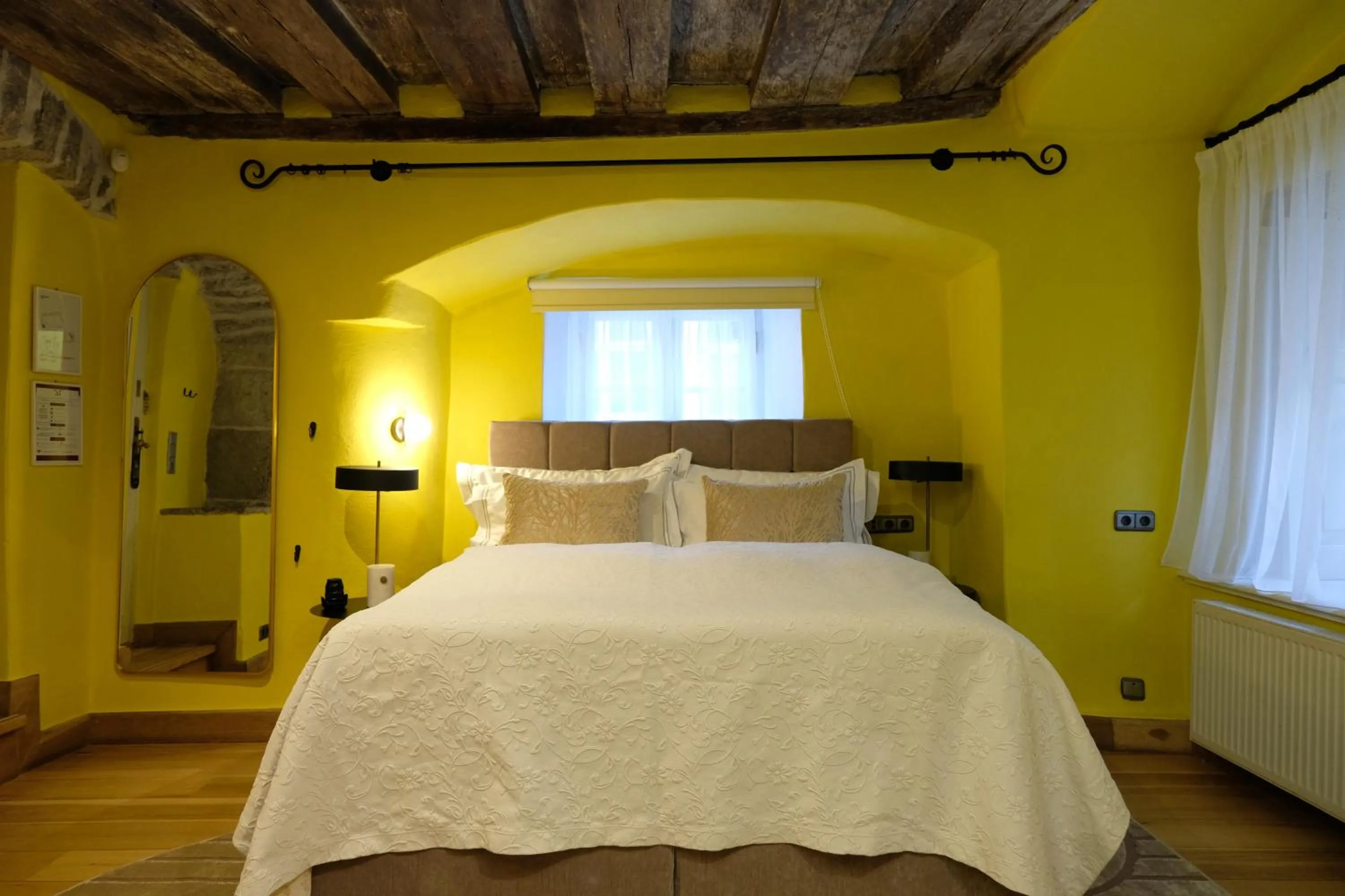 Bed in The Three Sisters Hotel