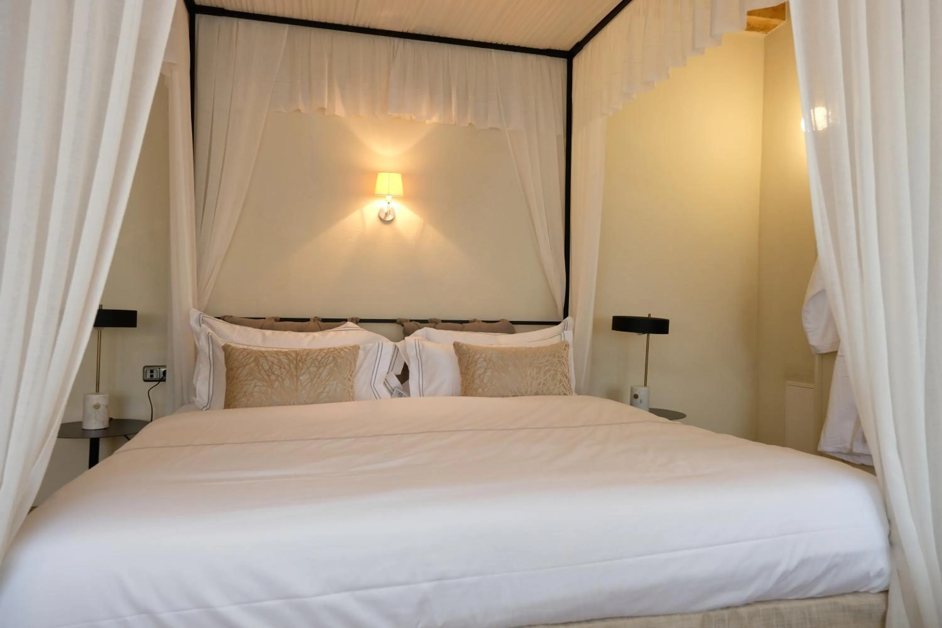 Bed in The Three Sisters Hotel