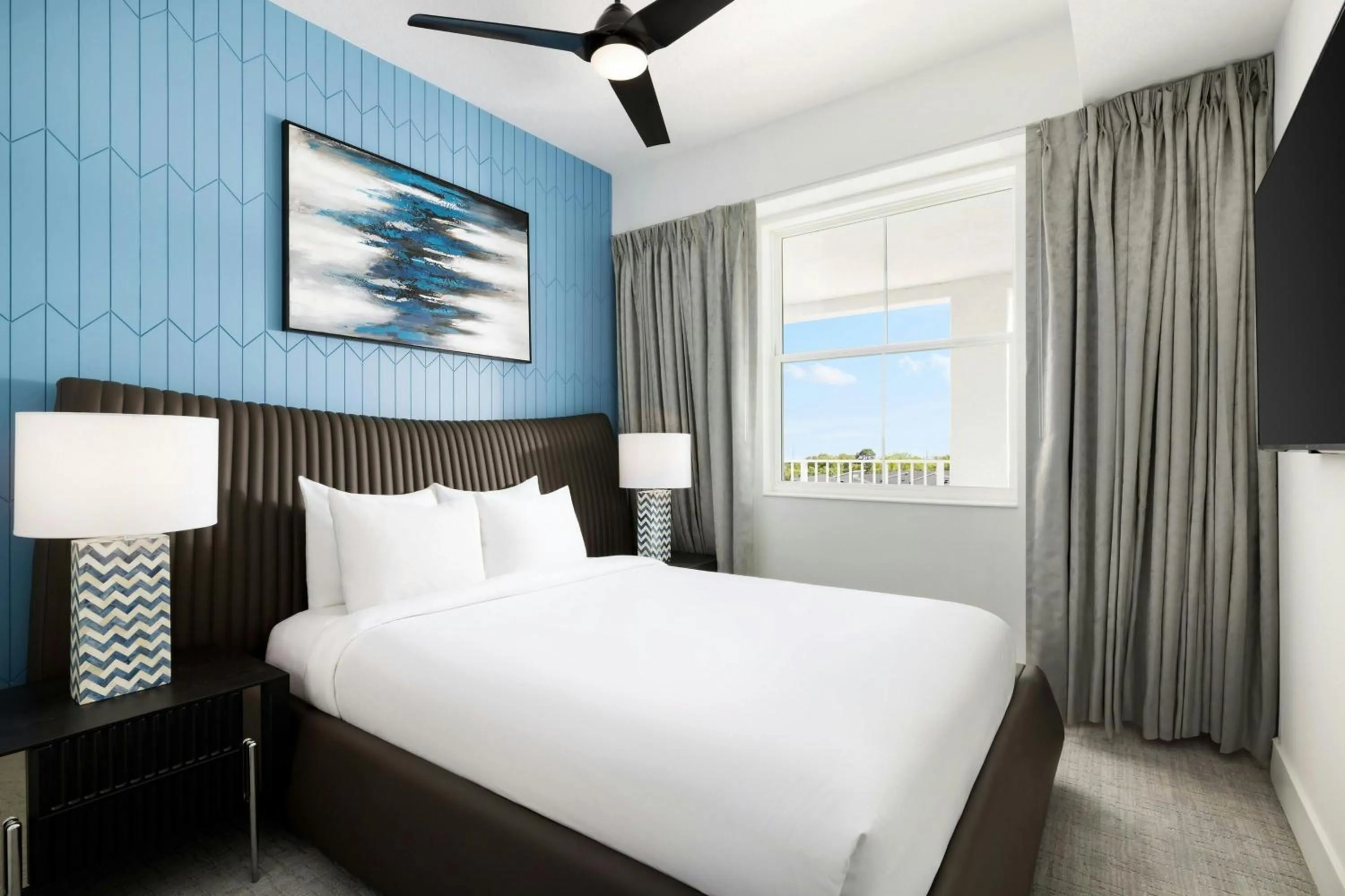 Bedroom, Bed in Villatel Orlando Resort, Apartments by Marriott Bonvoy