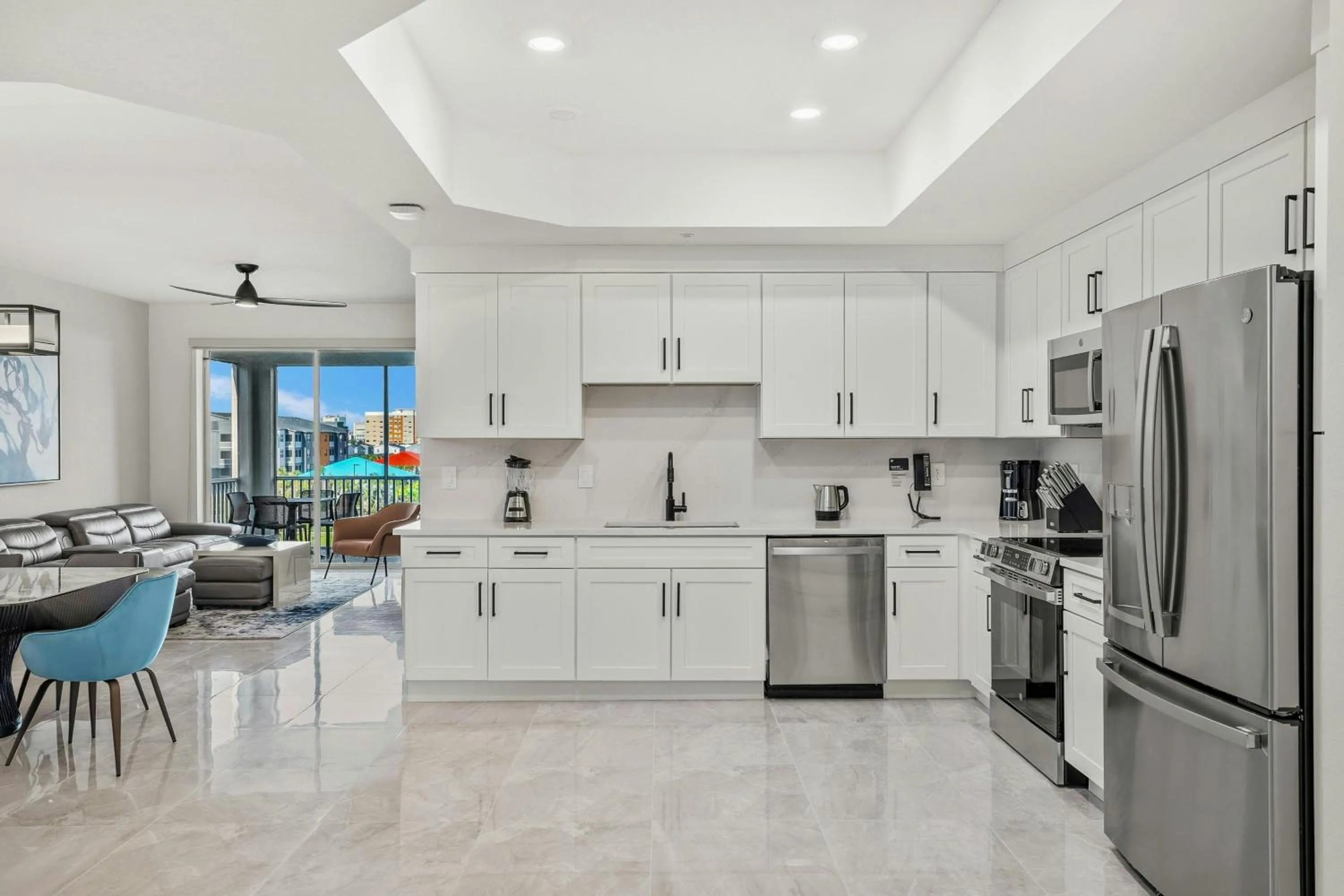 Kitchen or kitchenette in Villatel Orlando Resort, Apartments by Marriott Bonvoy